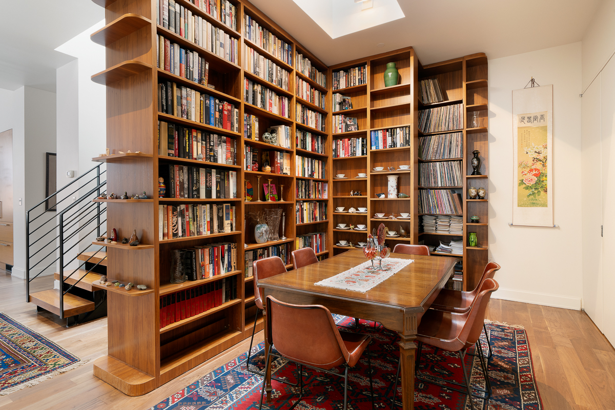 140 West 22nd Street, Unit PHC Manhattan, NY 10011 - Photo 5 of 15 a reading room with furniture and book shelf