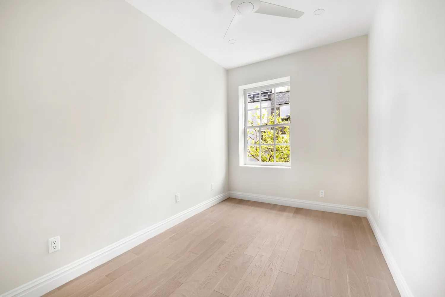 a view of walk in closet and bedroom view