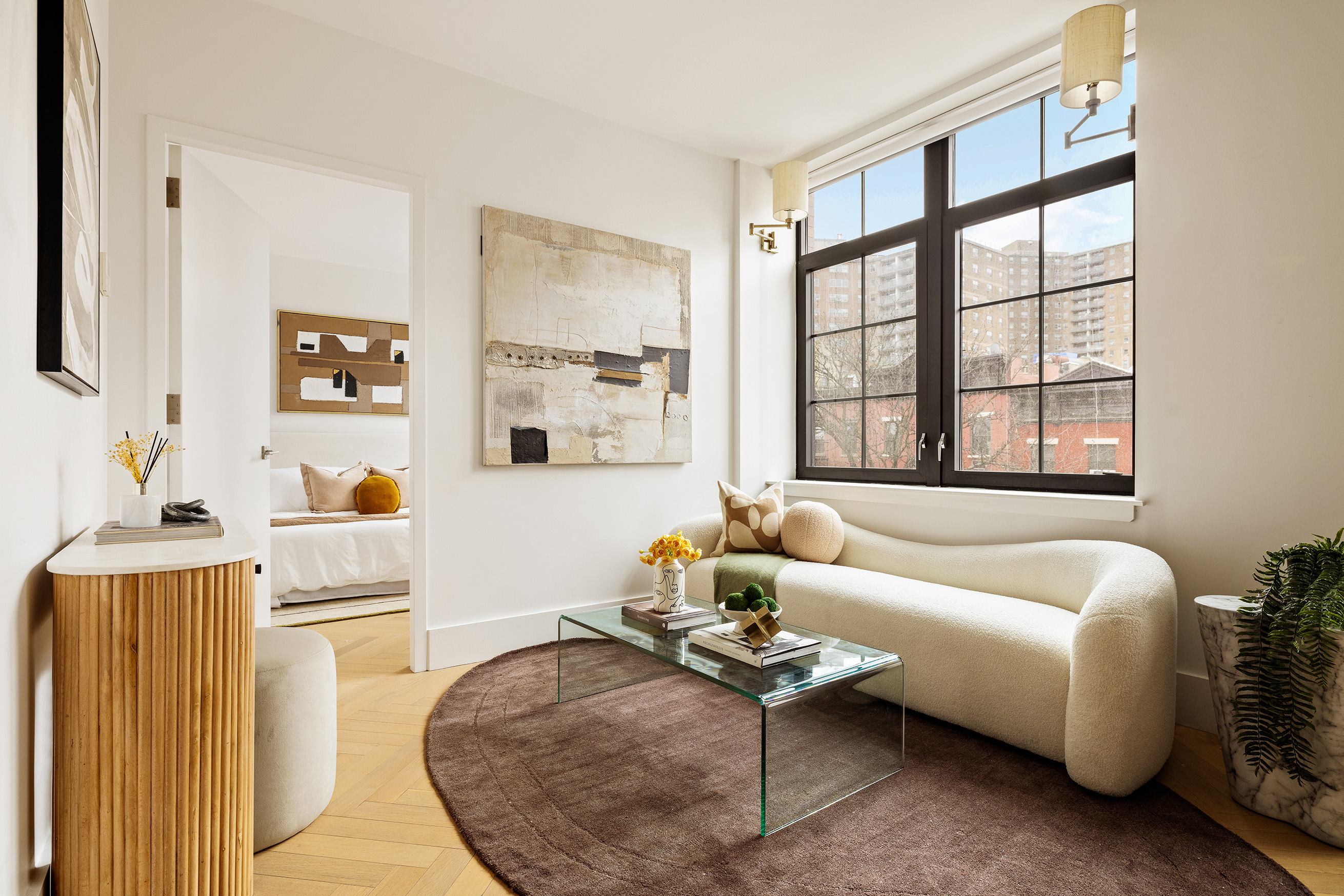 a living room with furniture and a window