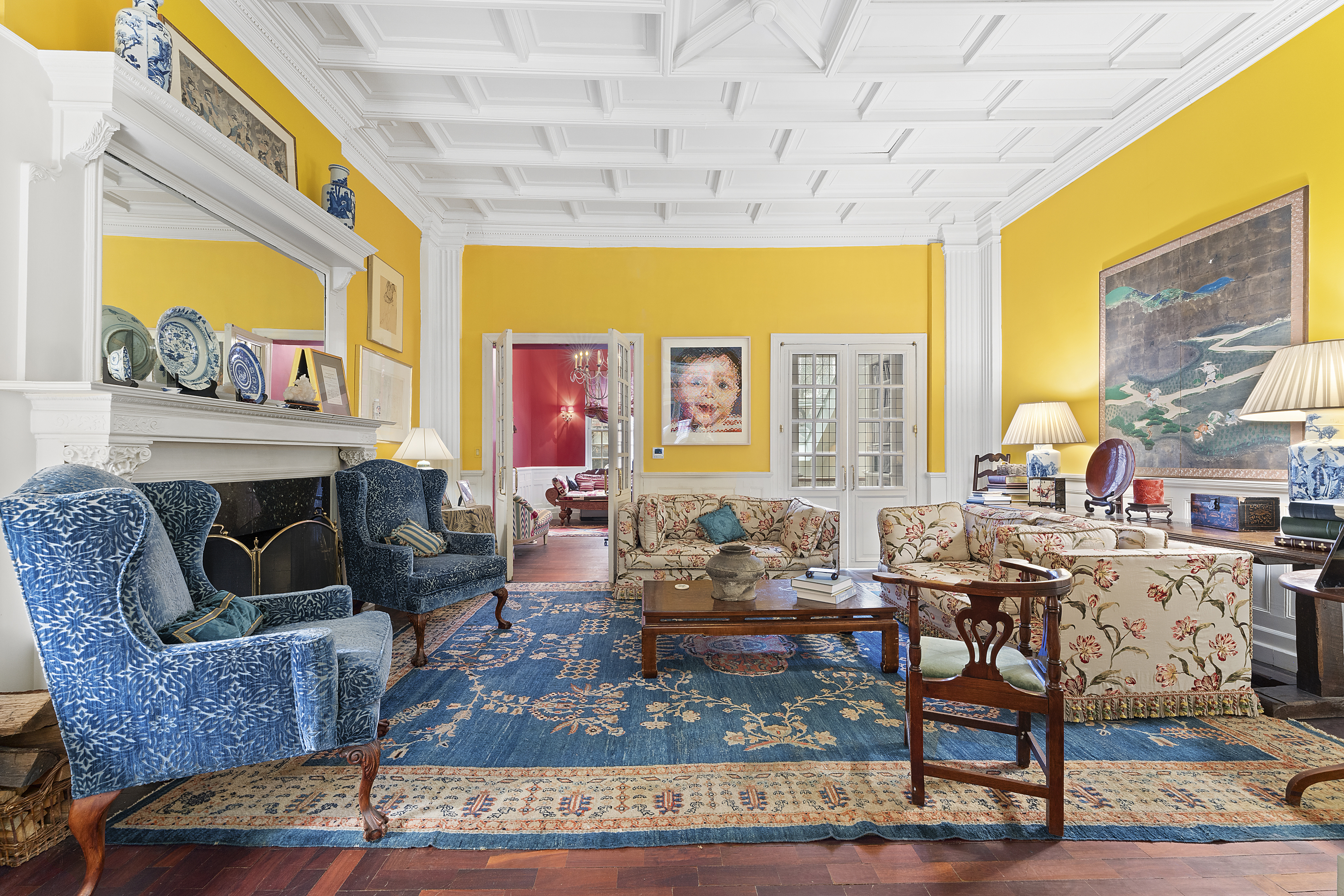 21 West 70th Street Manhattan, NY 10023 - Photo 2 of 12 a living room with fireplace furniture and a large window