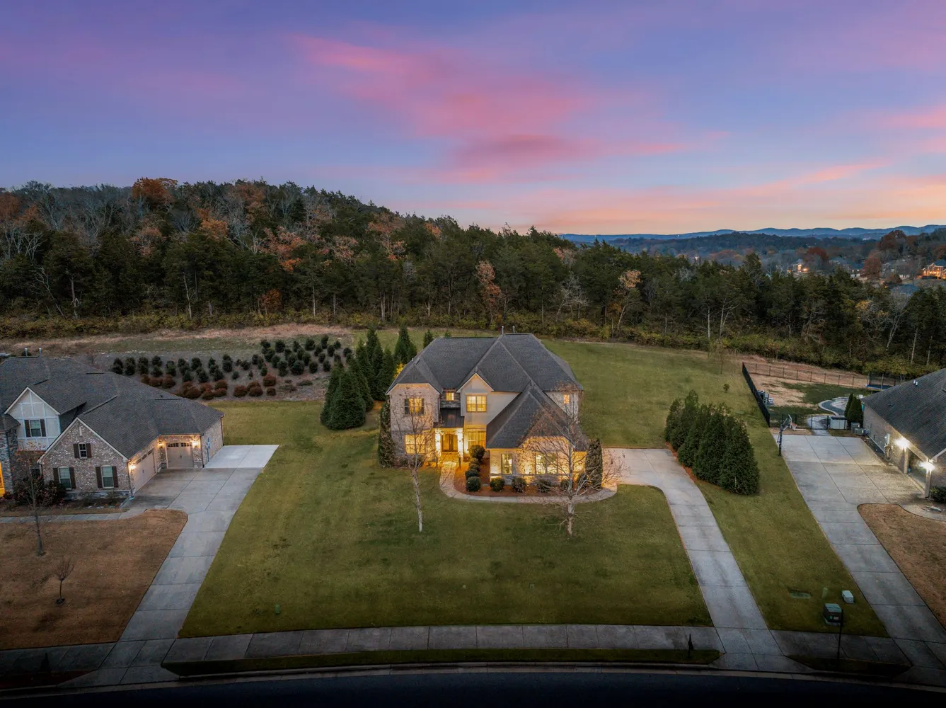 a view of a swimming pool with a yard