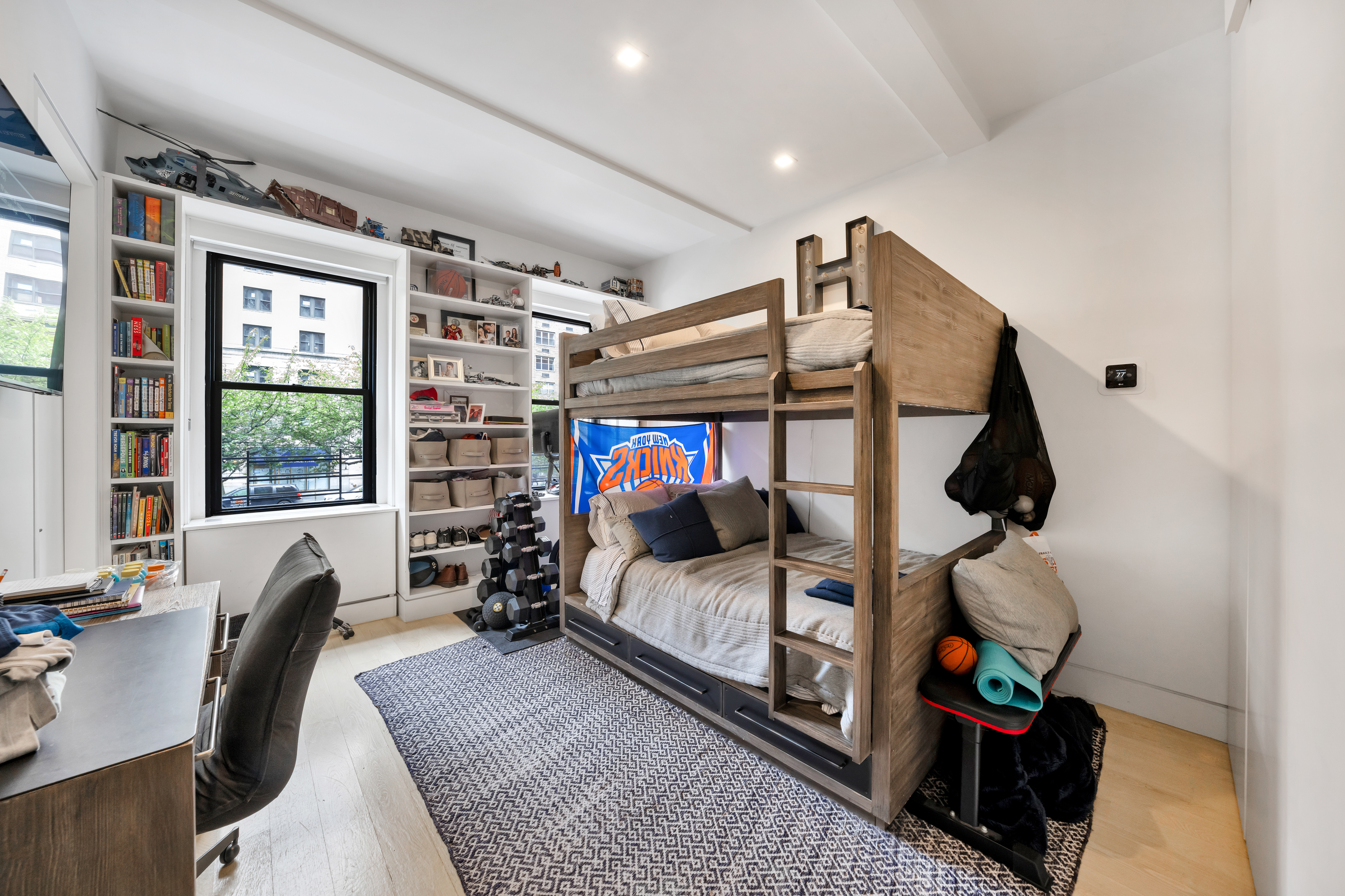 67 Park Avenue, Unit 2BC Manhattan, NY 10016 - Photo 14 of 16 a bedroom with furniture and a window