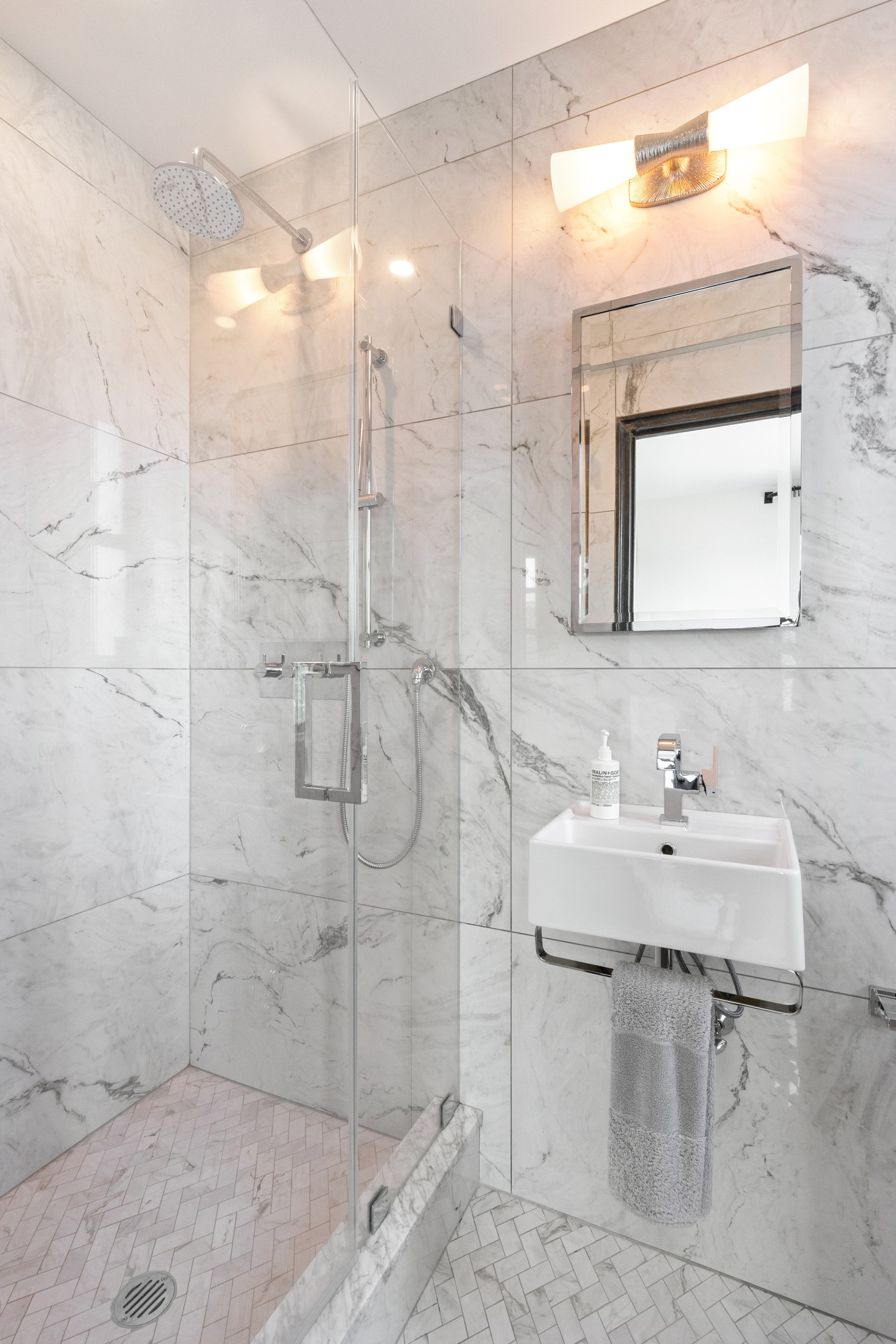 159-34 Riverside Drive West, Unit 5A Manhattan, NY 10032 - Photo 8 of 29 a bathroom with a sink mirror and toilet