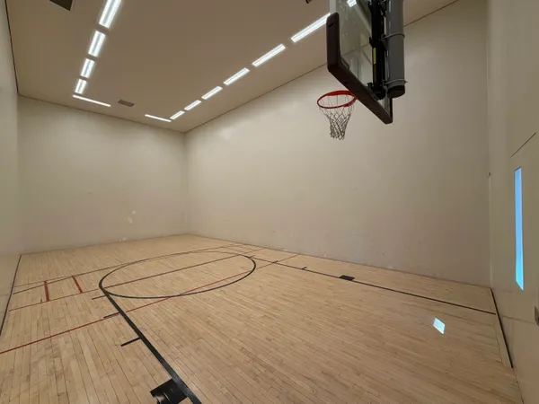 view of a room with rack on the wall