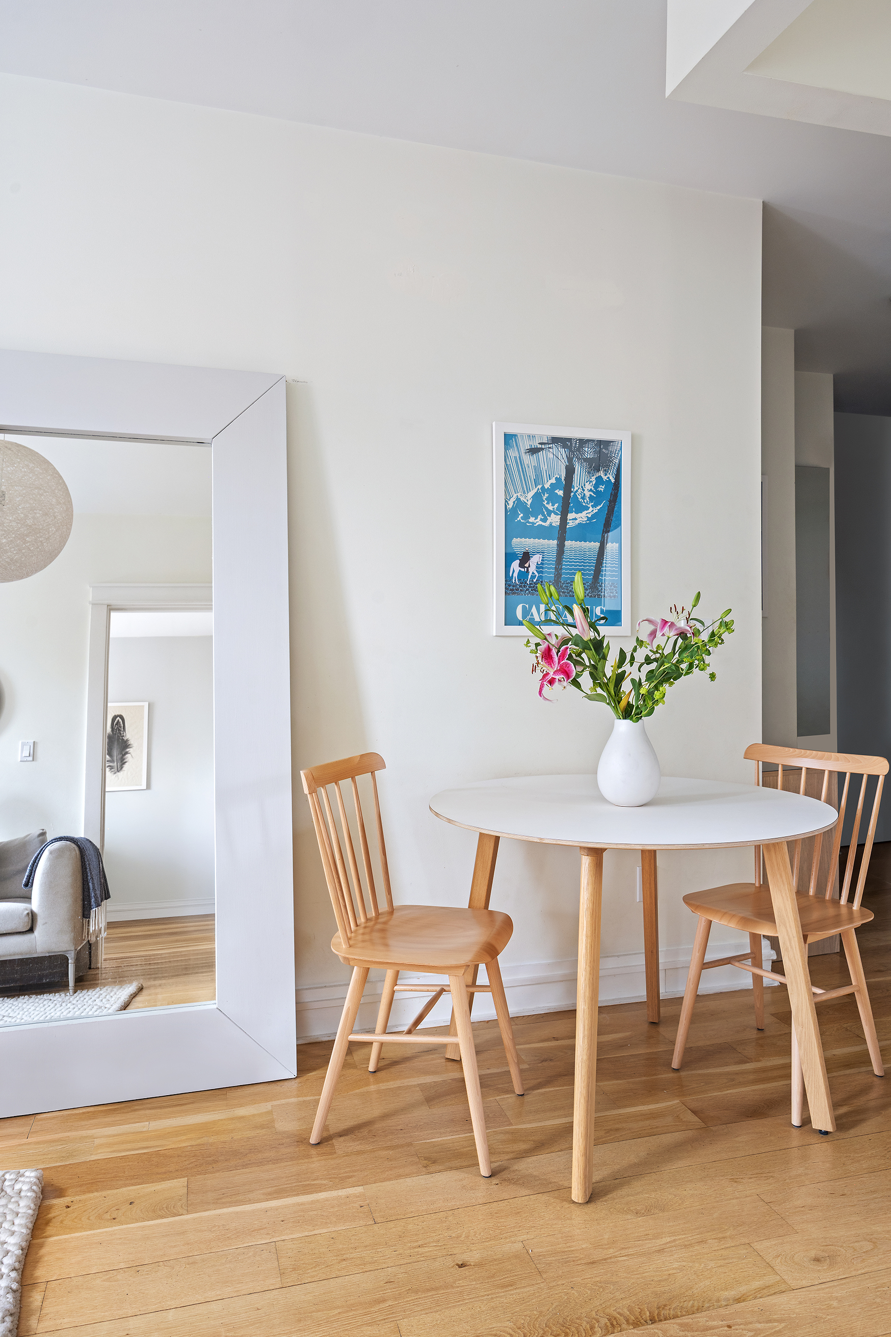 342 West 21st Street, Unit 4B Manhattan, NY 10011 - Photo 6 of 9 a view of a dining room with furniture and a potted plant