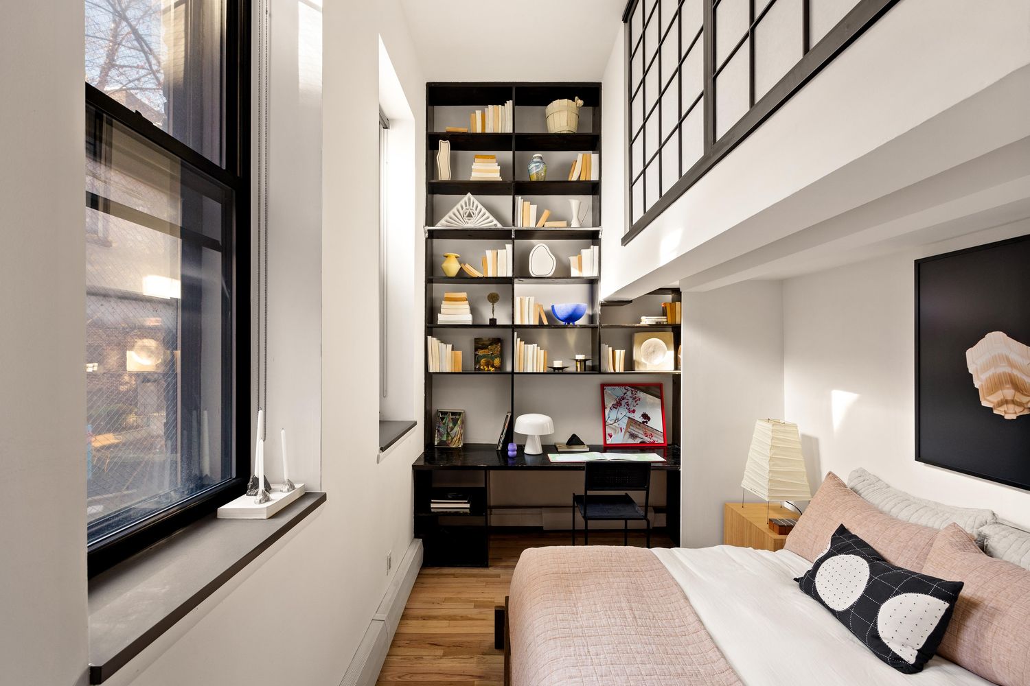 a bedroom with a bed and closet