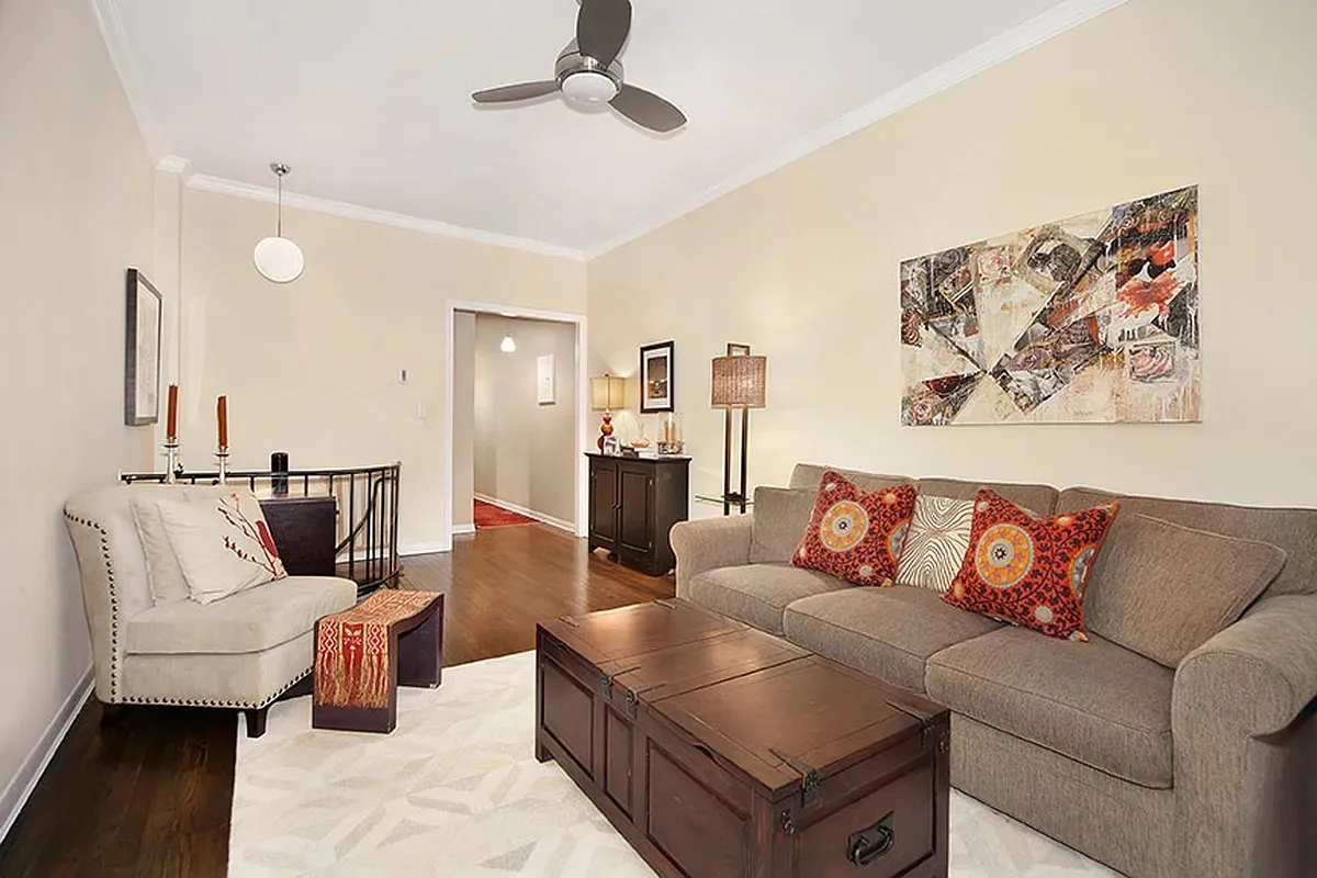 a living room with furniture and a couch