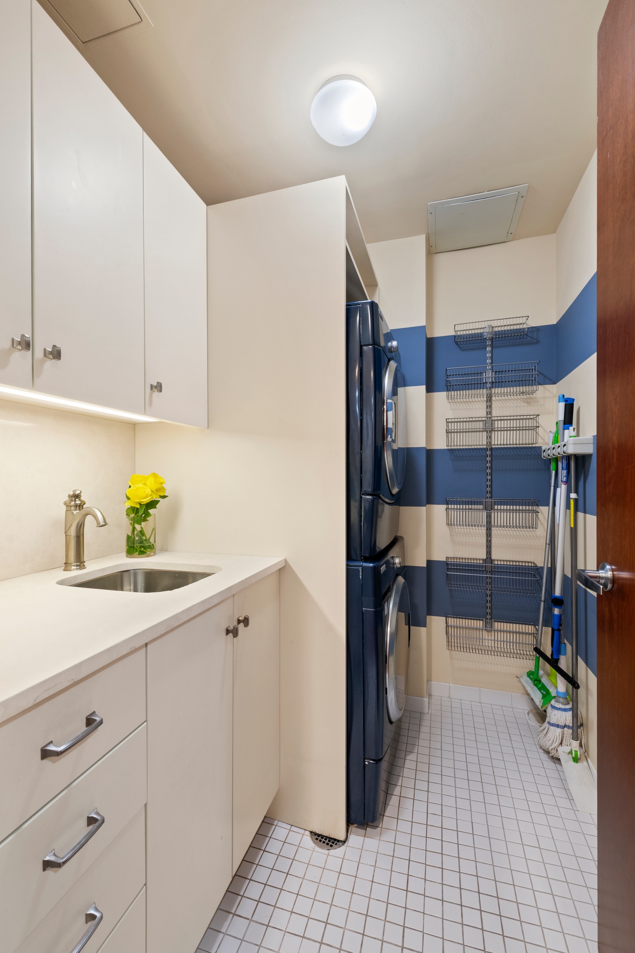 50 West 15th Street, Unit 2D Manhattan, NY 10011 - Photo 11 of 15 a kitchen with a sink and cabinets