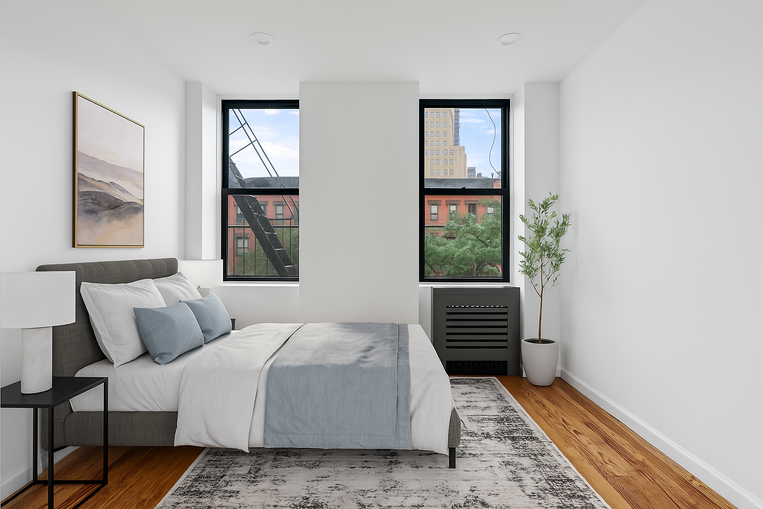 746 9th Avenue, Unit 4DF Manhattan, NY 10019 - Photo 3 of 13 a bedroom with a bed and a window