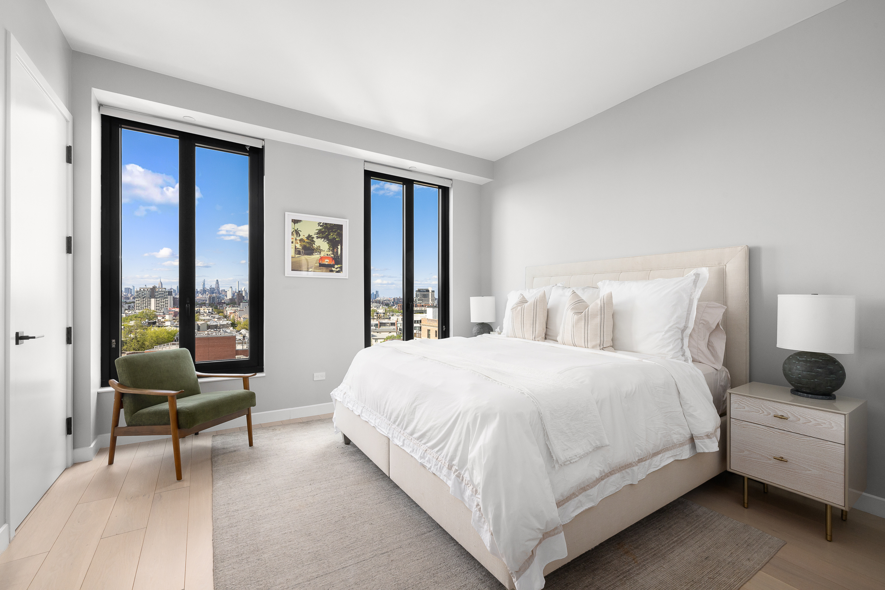 856 Washington Avenue, Unit 9A Brooklyn, NY 11238 - Photo 8 of 25 a bedroom with a bed and a large window