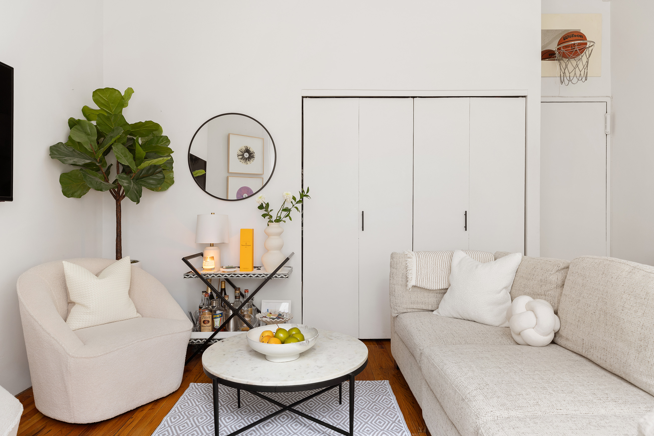 2 Cornelia Street, Unit 201 Manhattan, NY 10014 - Photo 2 of 11 a living room with furniture