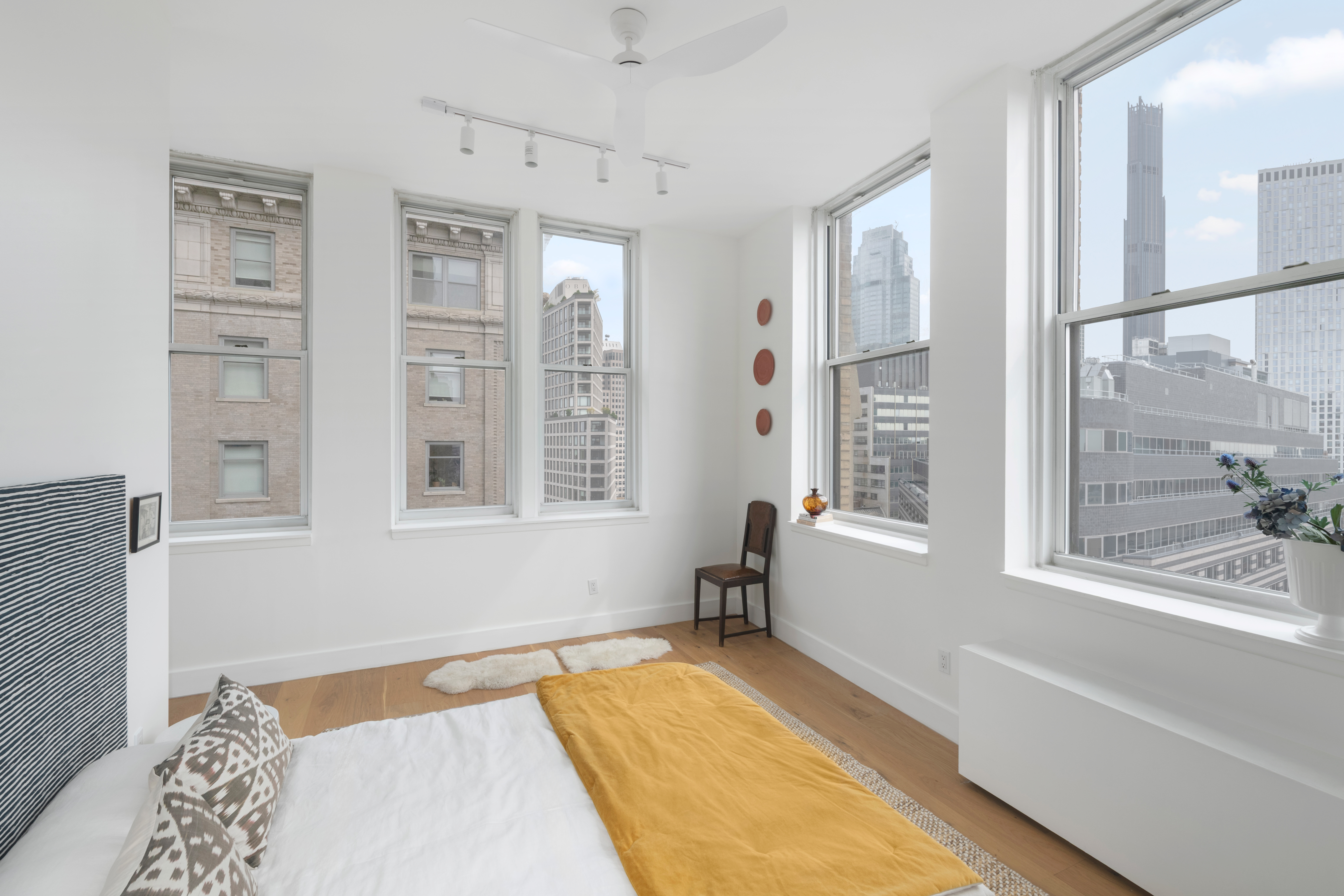 96 Schermerhorn Street, Unit 11F Brooklyn, NY 11201 - Photo 8 of 13 a bathroom with sink a bathtub and next to a window