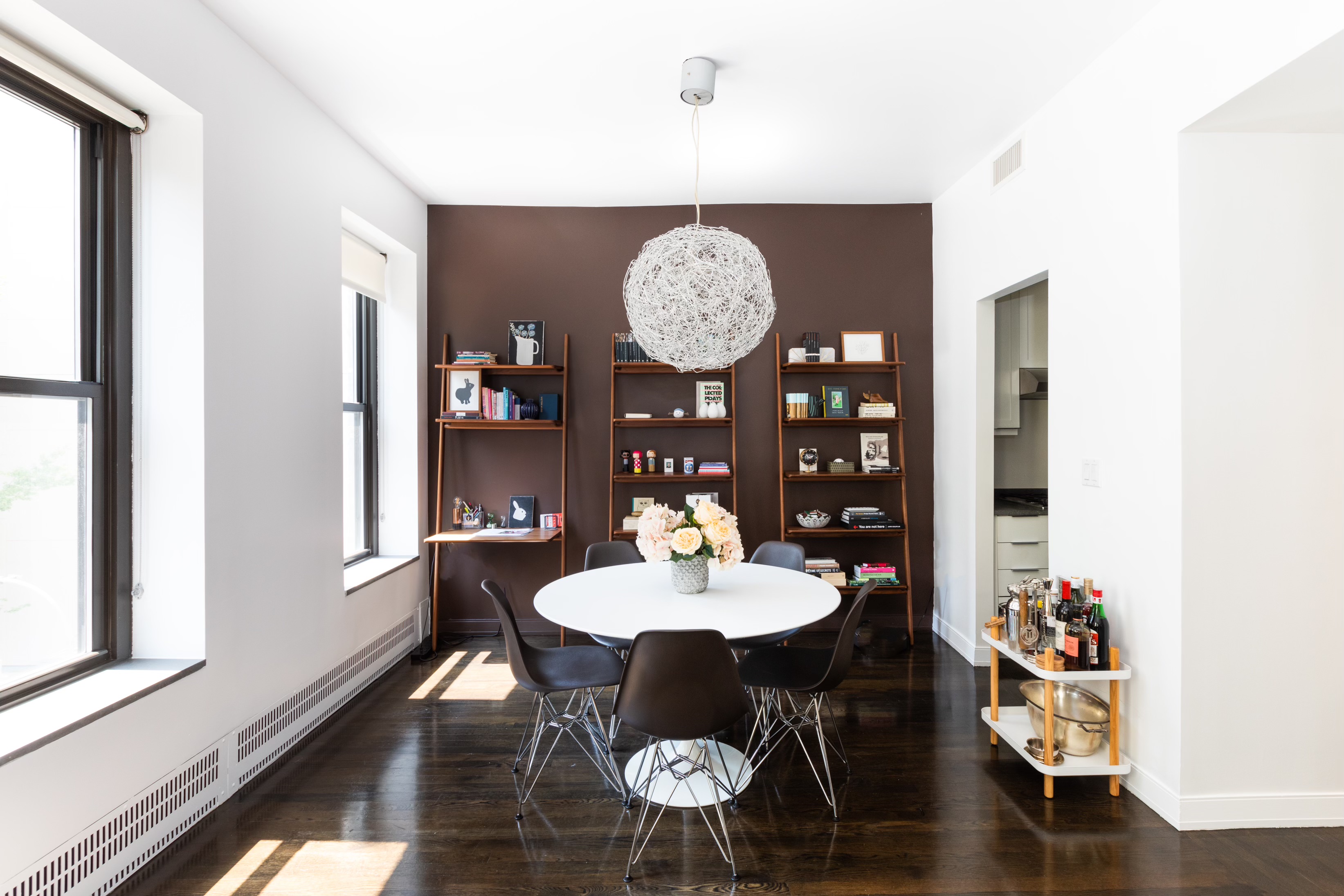 422 West 20th Street, Unit 3G Manhattan, NY 10011 - Photo 5 of 15 a view of a dining room with furniture and wooden floor