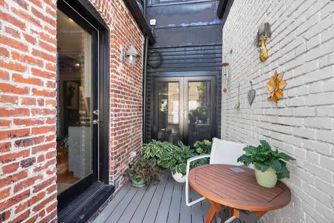 a bed room with a bed mirror and a mirror