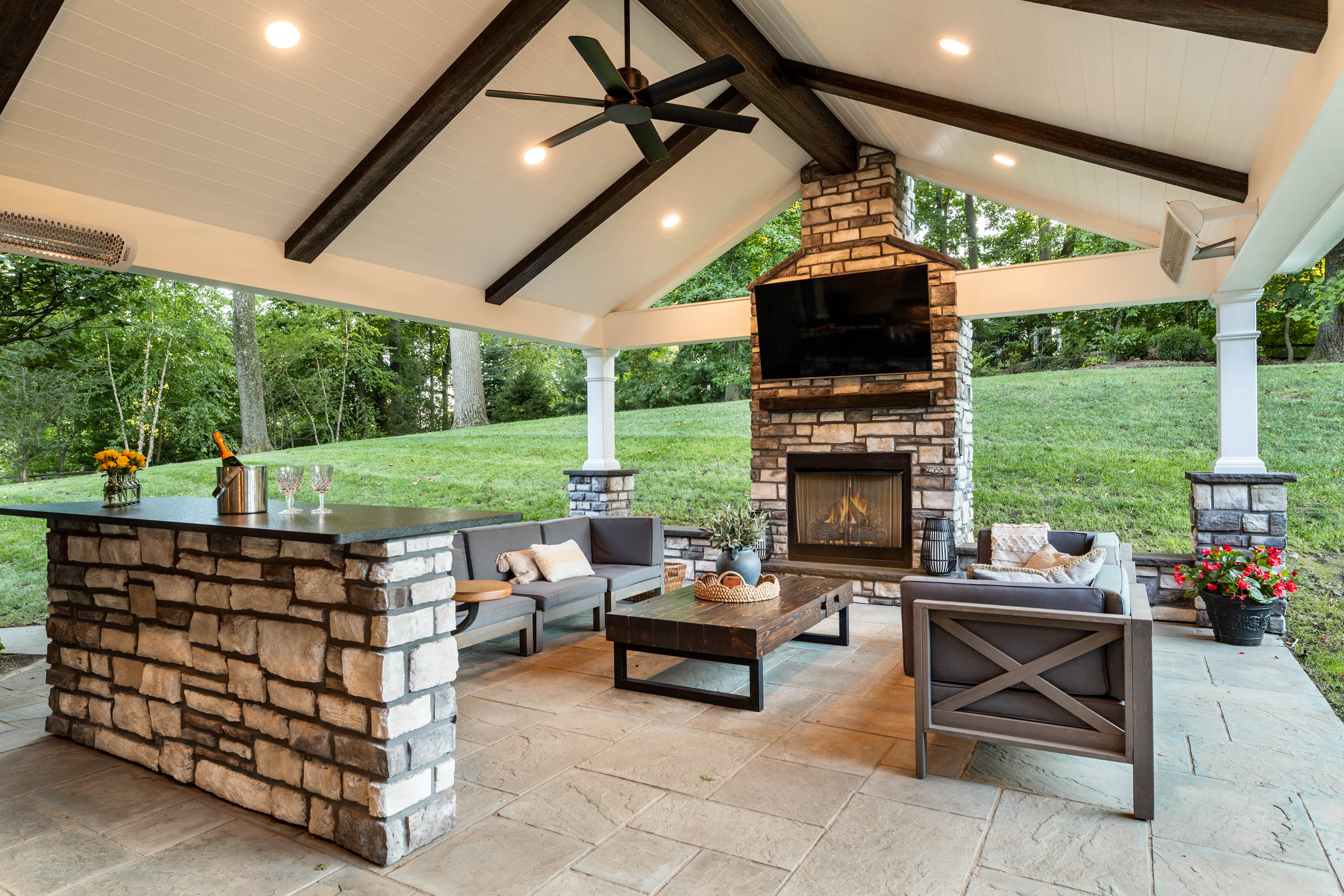 710 South Valley Forge Road Devon, PA 19333 - Photo 3 of 47 a living room with patio furniture and a fireplace