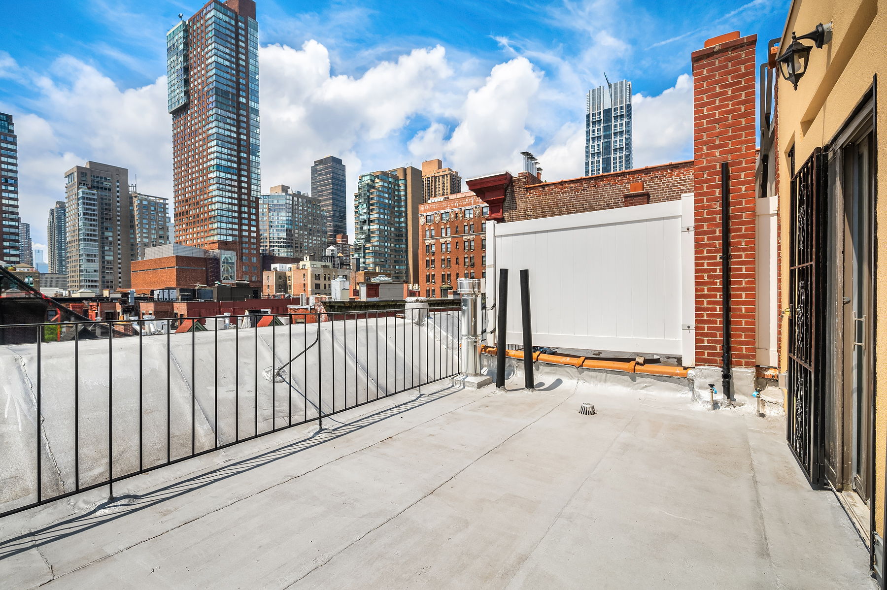 61 West 70th Street, Unit PH Manhattan, NY 10023 - Photo 2 of 18 a view of city with balcony