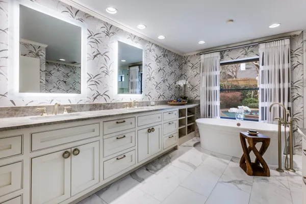 a view of a livingroom with furniture and hardwood floor