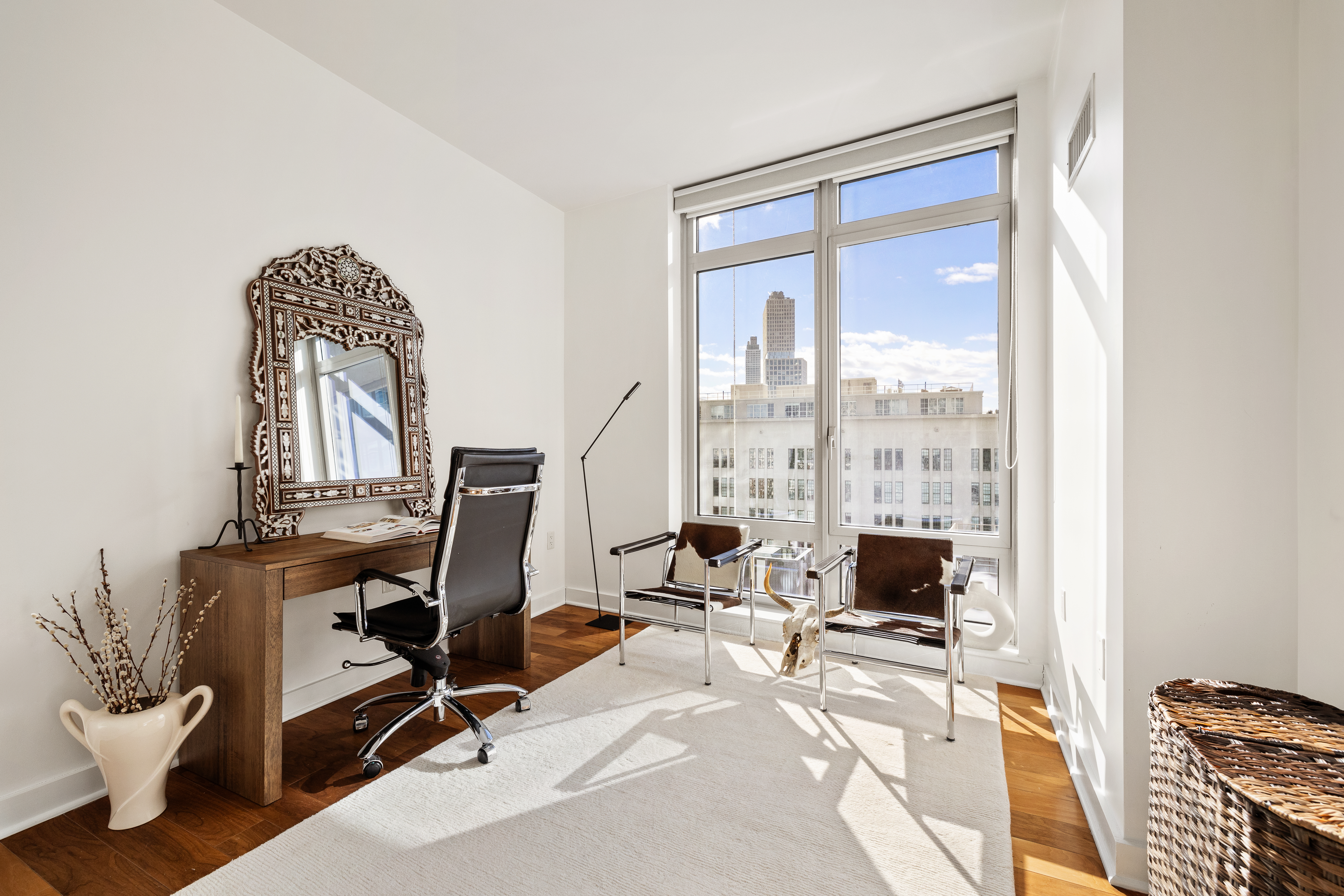 2 Northside Piers, Unit 8A Brooklyn, NY 11249 - Photo 8 of 11 a view of a workspace with furniture and a window