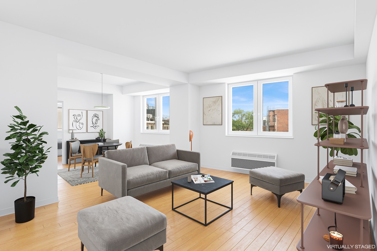a living room with furniture and a potted plant