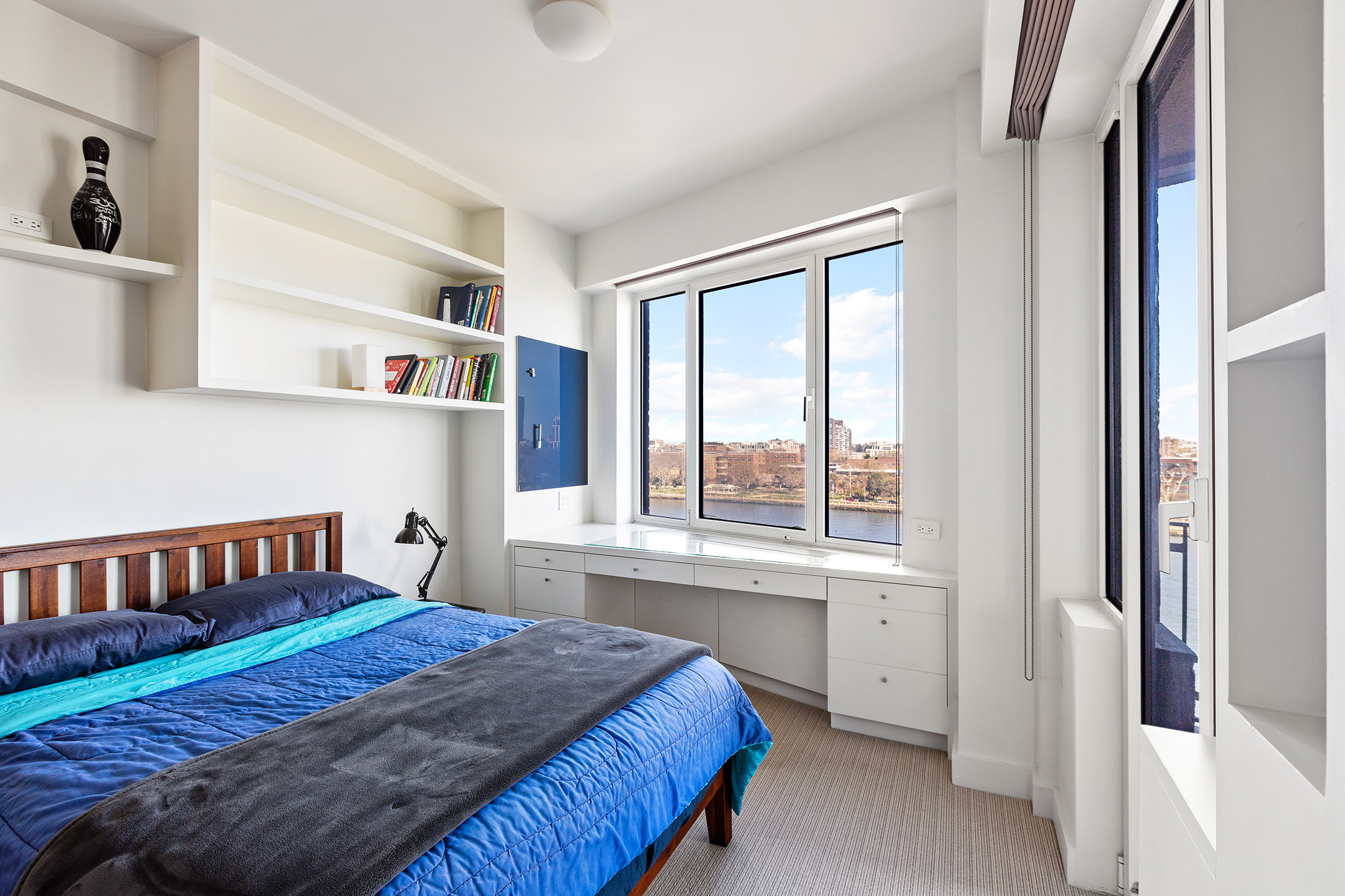 45 East End Avenue, Unit 6/7B Manhattan, NY 10028 - Photo 10 of 17 a bedroom with a bed and a window