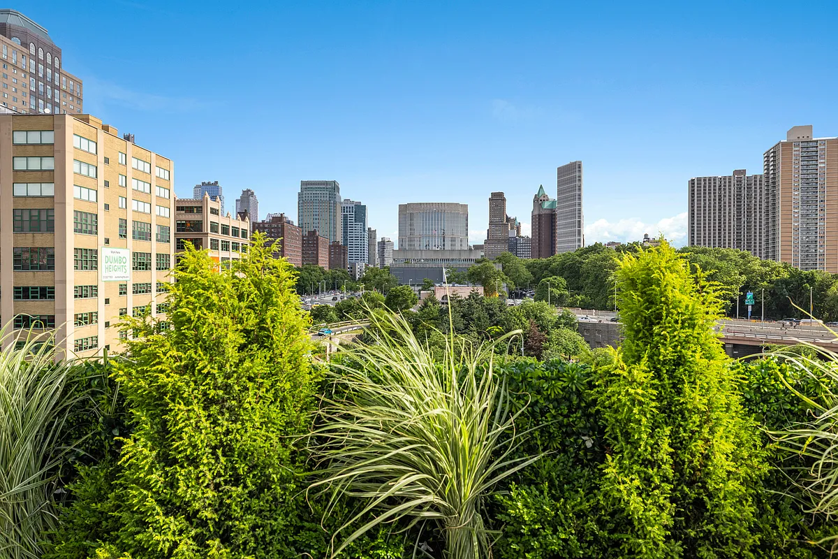 98 Front Street, Unit PH Brooklyn, NY 11201 - Photo 25 of 26 a view of a city with tall buildings