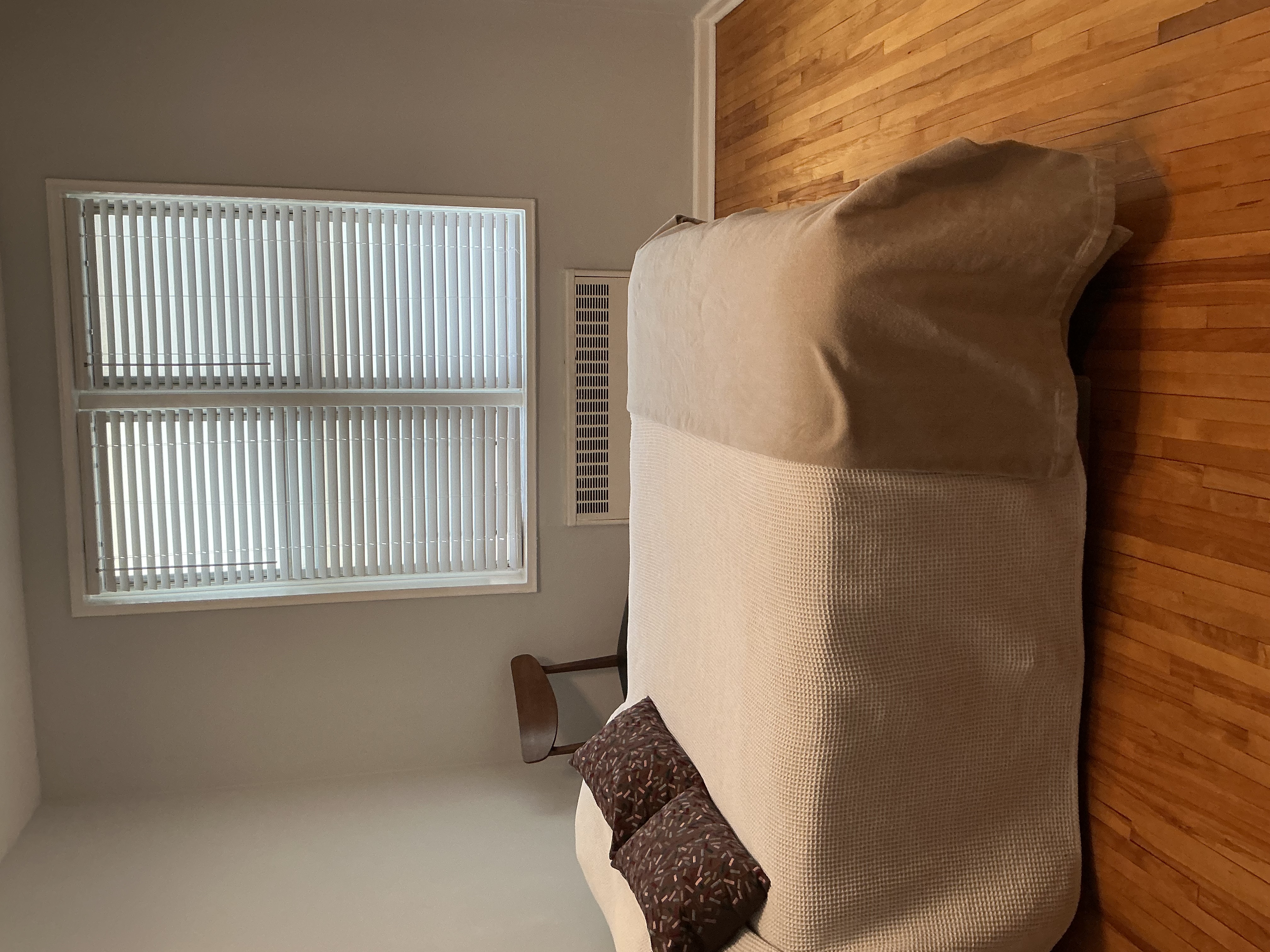 9801 Shore Road, Unit 2B Brooklyn, NY 11209 - Photo 7 of 13 a bedroom with a bed and a window