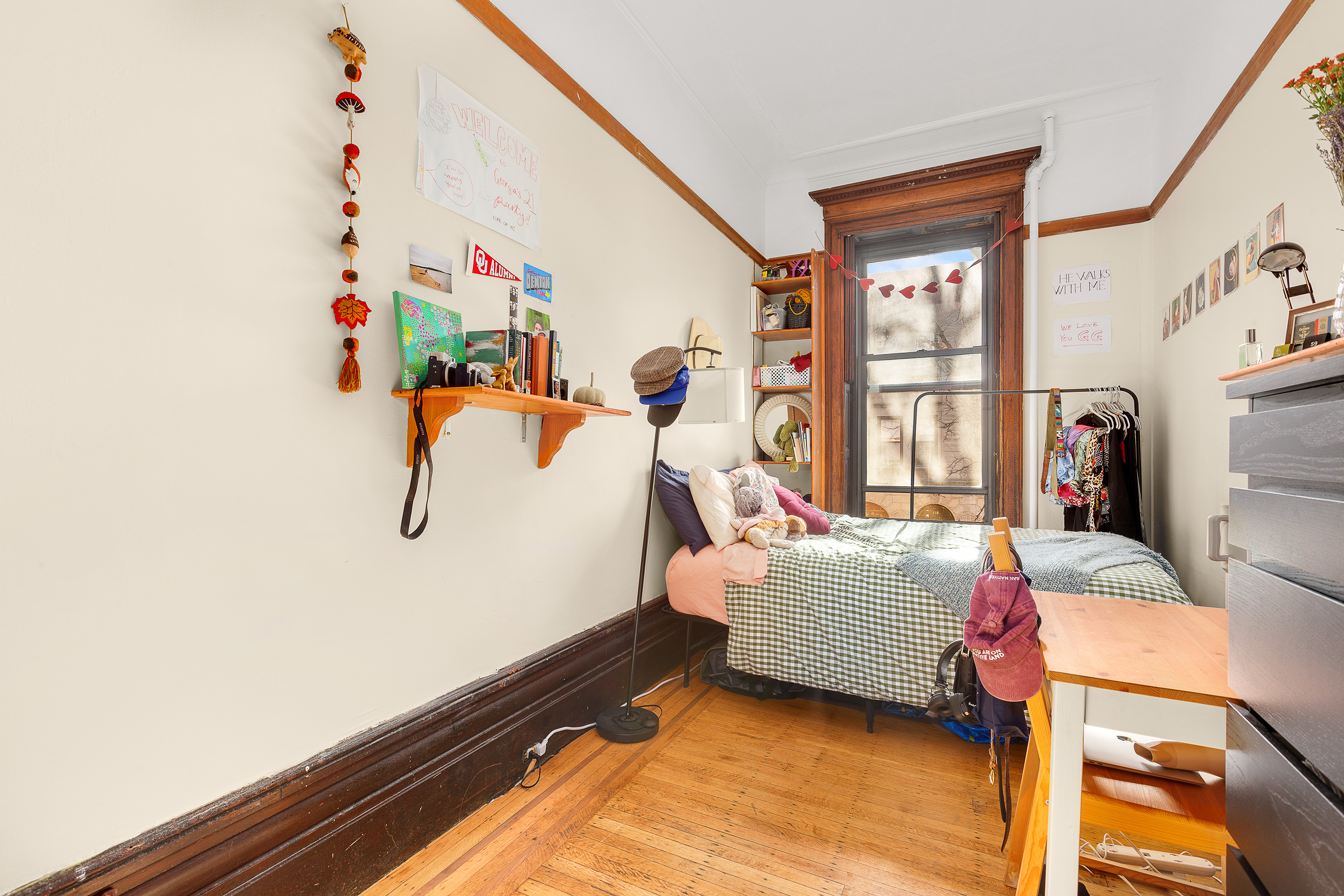 117 West 120th Street Manhattan, NY 10027 - Photo 23 of 31 a bedroom with furniture and a window