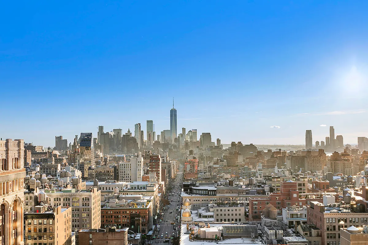 101 West 24th Street, Unit 26D Manhattan, NY 10011 - Photo 7 of 18 a view of a city with tall buildings in the background