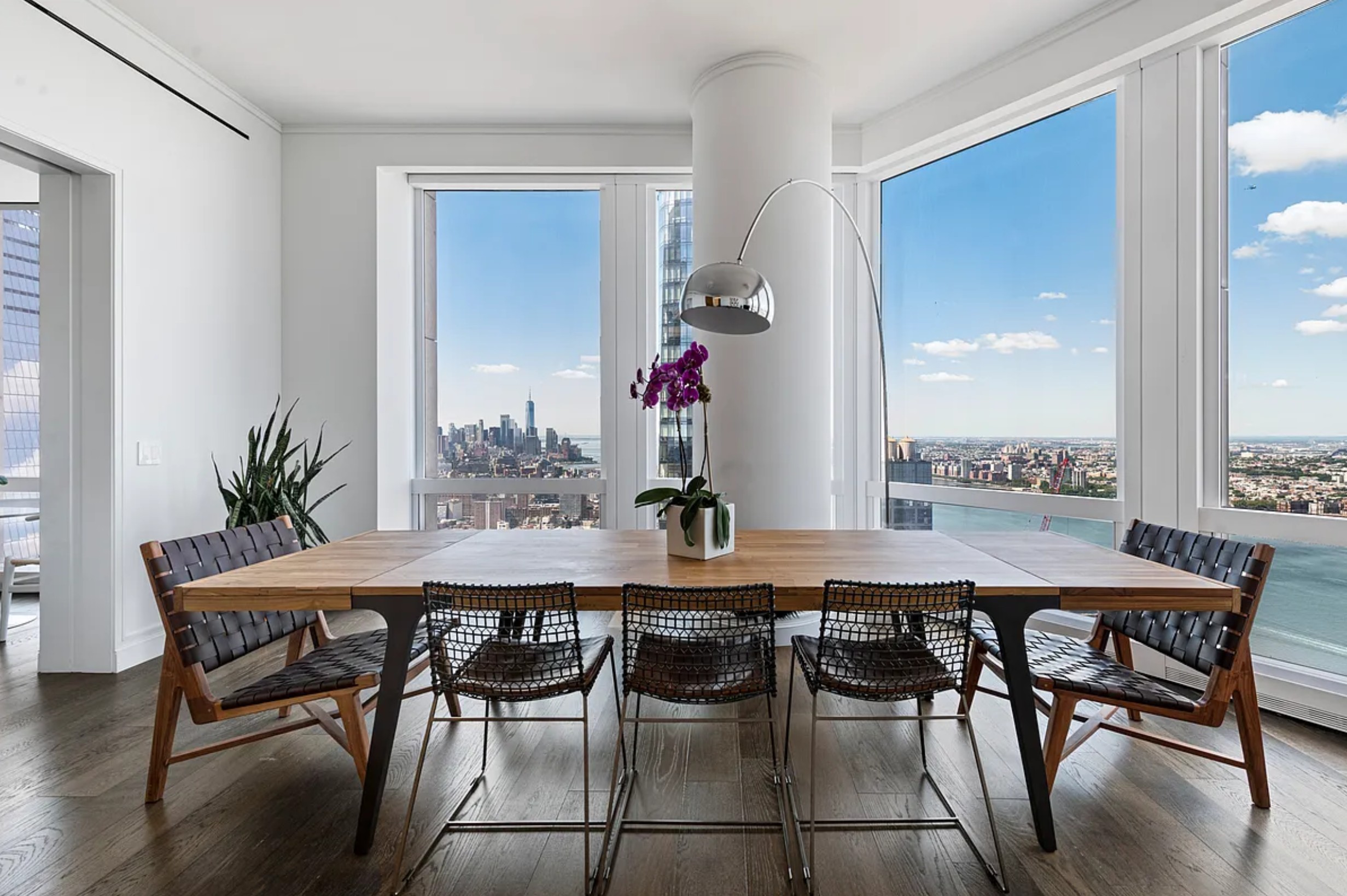 35 Hudson Yards, Unit 6701 Manhattan, NY 10001 - Photo 5 of 23 a view of a dining room with furniture and window