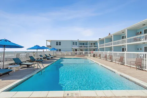 a view of pool and outdoor space