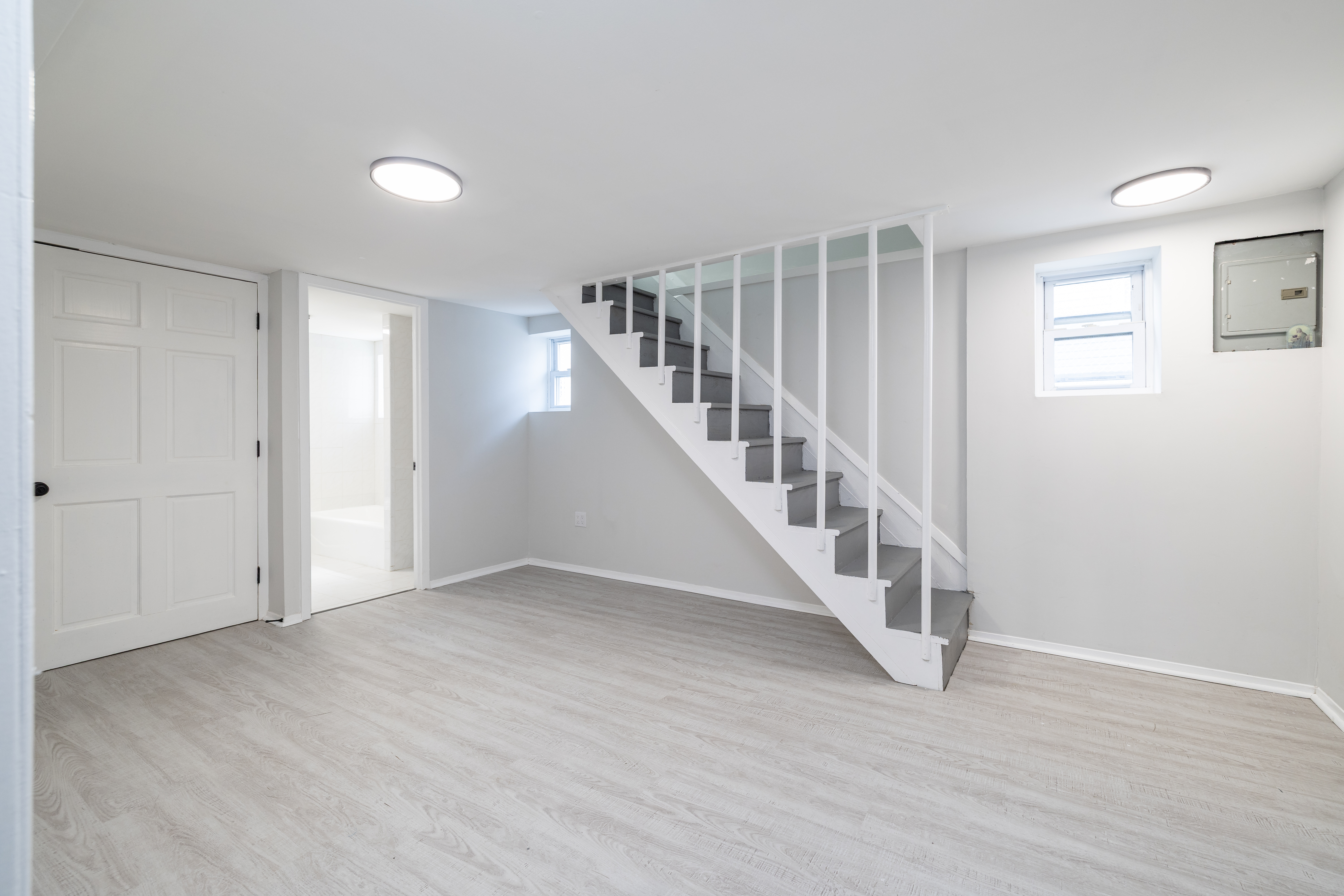13-03 Brunswick Avenue Queens, NY 11691 - Photo 19 of 27 a view of an empty room with wooden floor and entryway