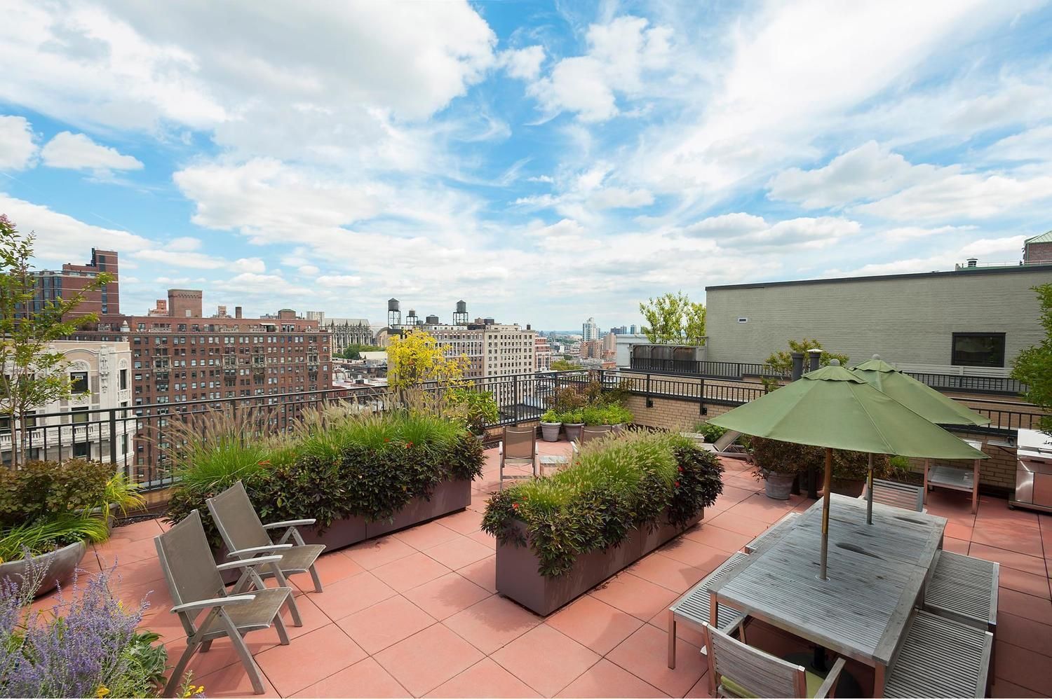 a view of a terrace with sitting area