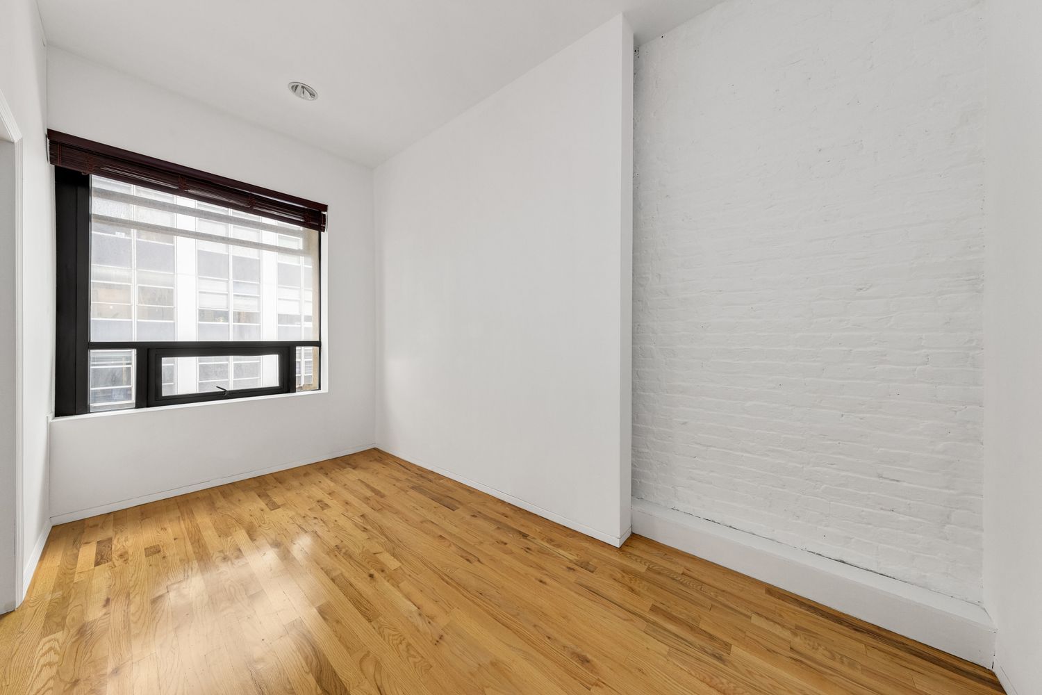 24 Beaver Street Manhattan, NY 10004 - Photo 18 of 25 a view of empty room with window