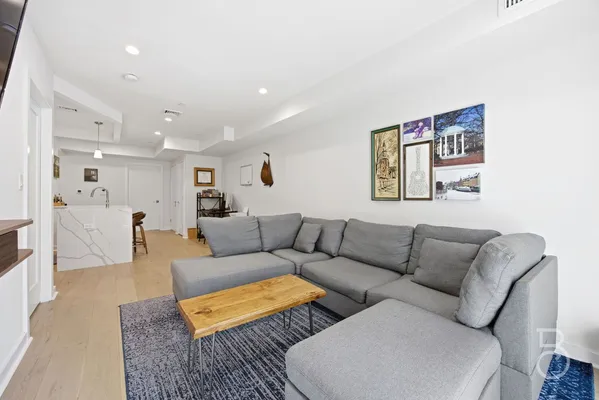 a living room with furniture and a couch