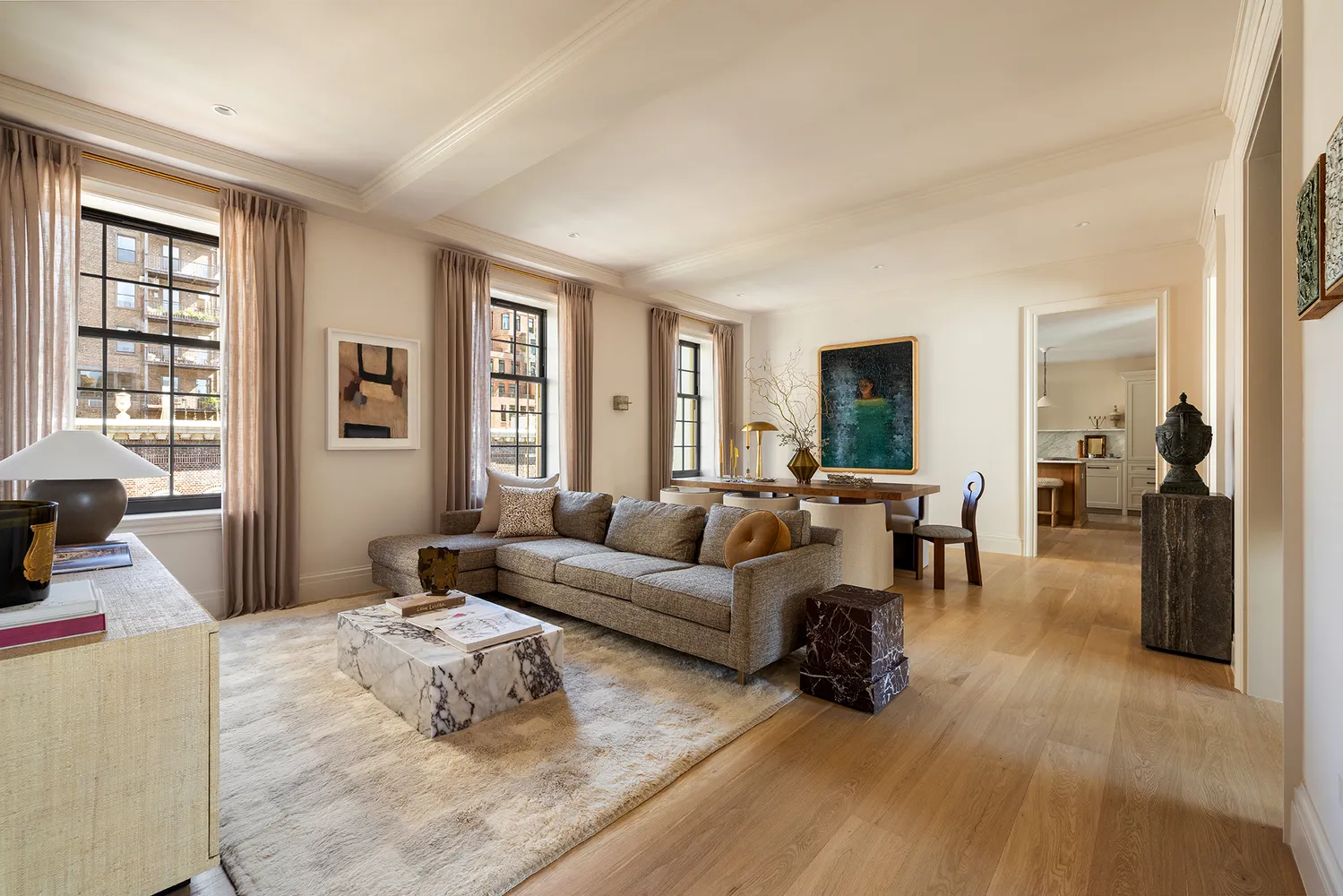 a living room with furniture window and wooden floor