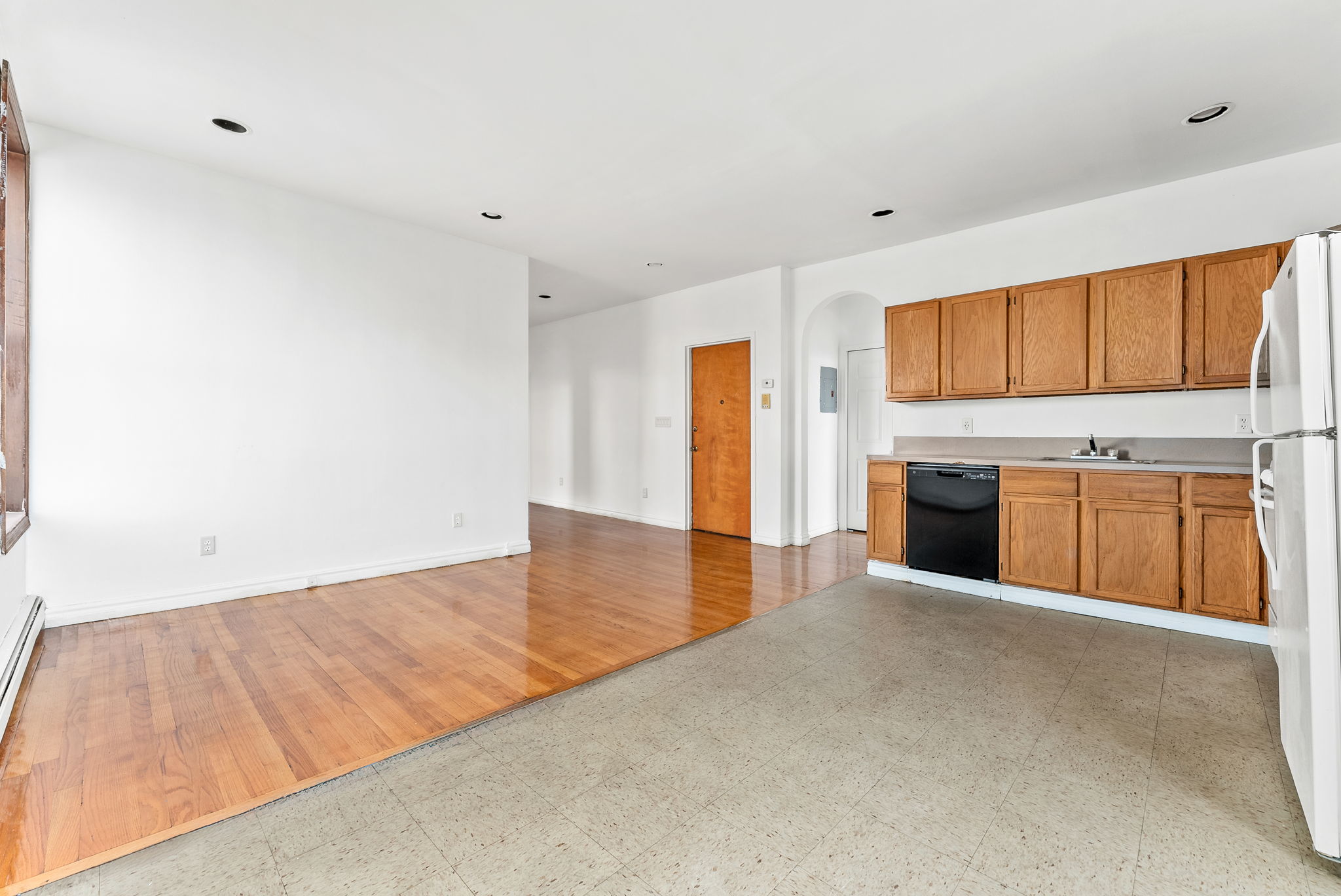 462 3rd Avenue, Unit 2 Brooklyn, NY 11215 - Photo 2 of 8 a view of a kitchen with a sink cabinets and a kitchen counter top space