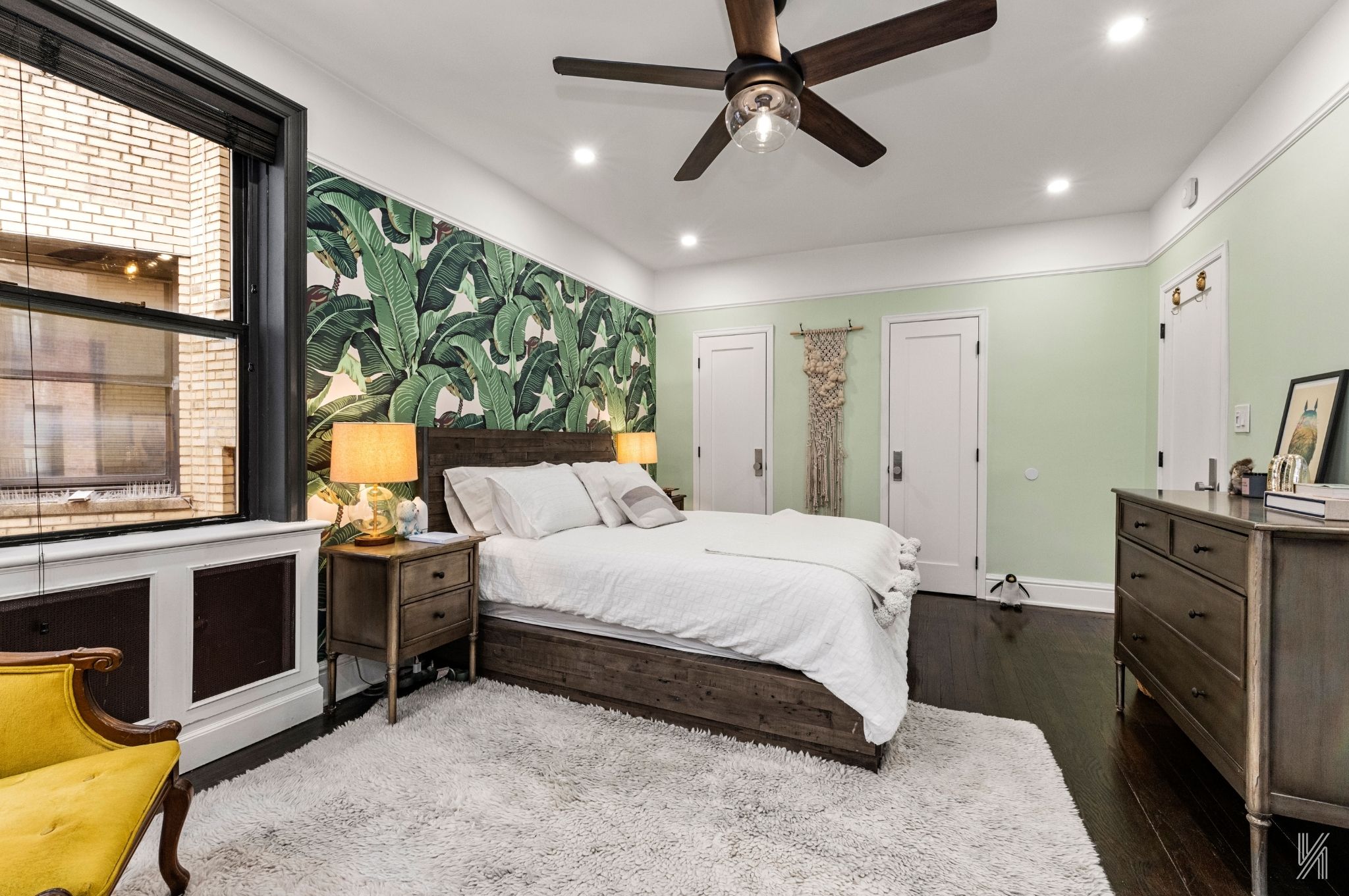 35-06 88th Street, Unit 3G Queens, NY 11372 - Photo 13 of 20 a bed room with a bed and a television