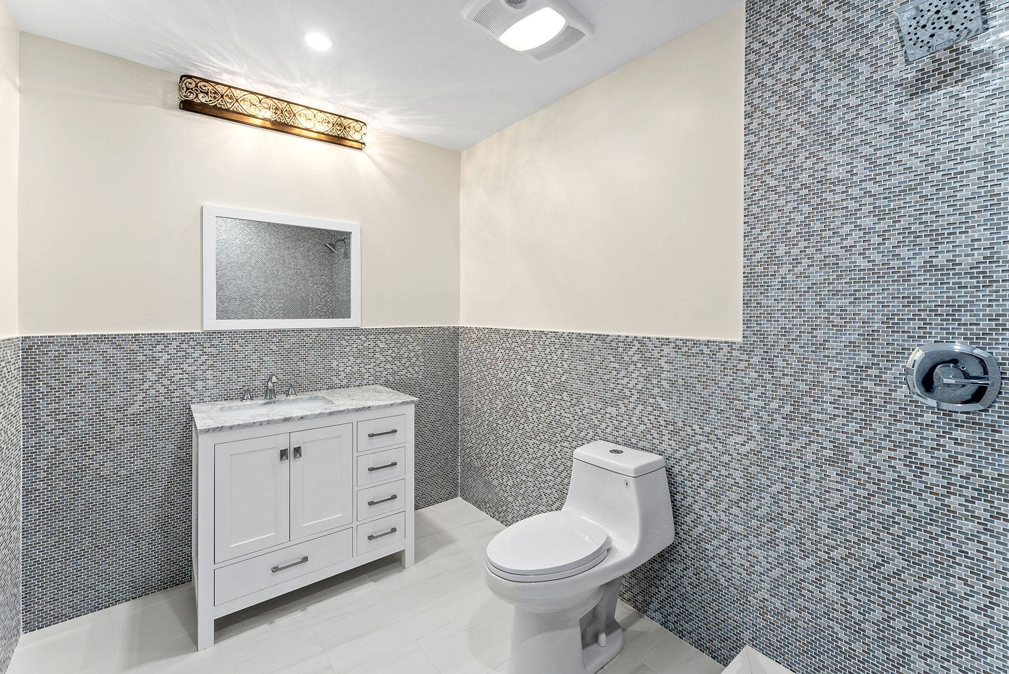 217 Butler Street, Unit 2 Brooklyn, NY 11217 - Photo 11 of 15 a bathroom with a toilet sink and mirror