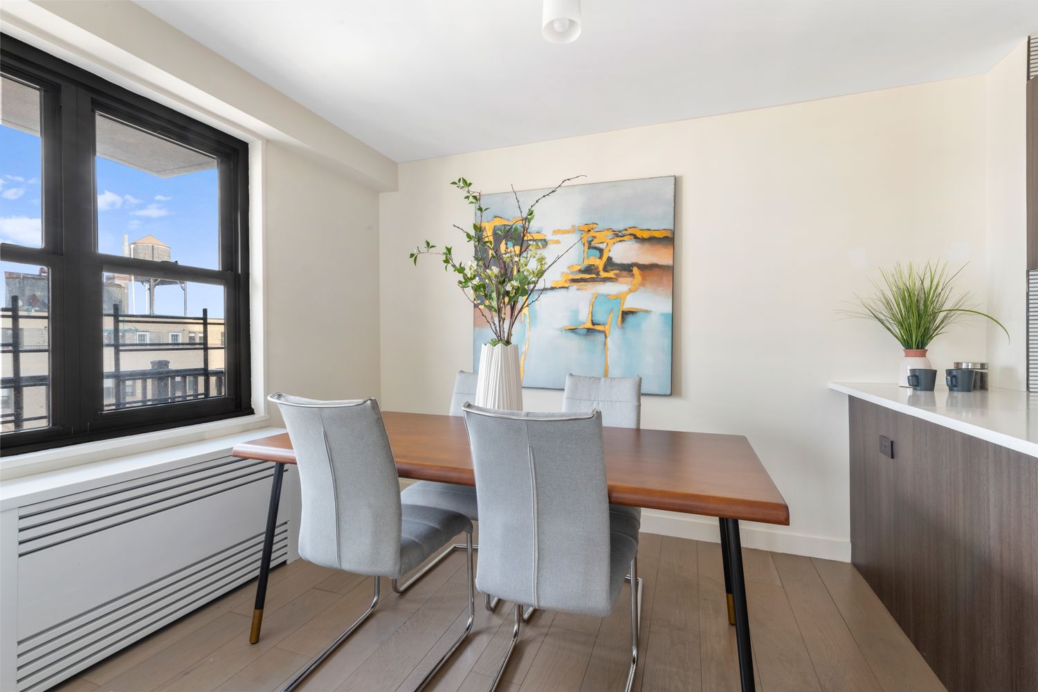 175 West 95th Street, Unit 19F Manhattan, NY 10025 - Photo 4 of 16 a view of a dining room with furniture and window