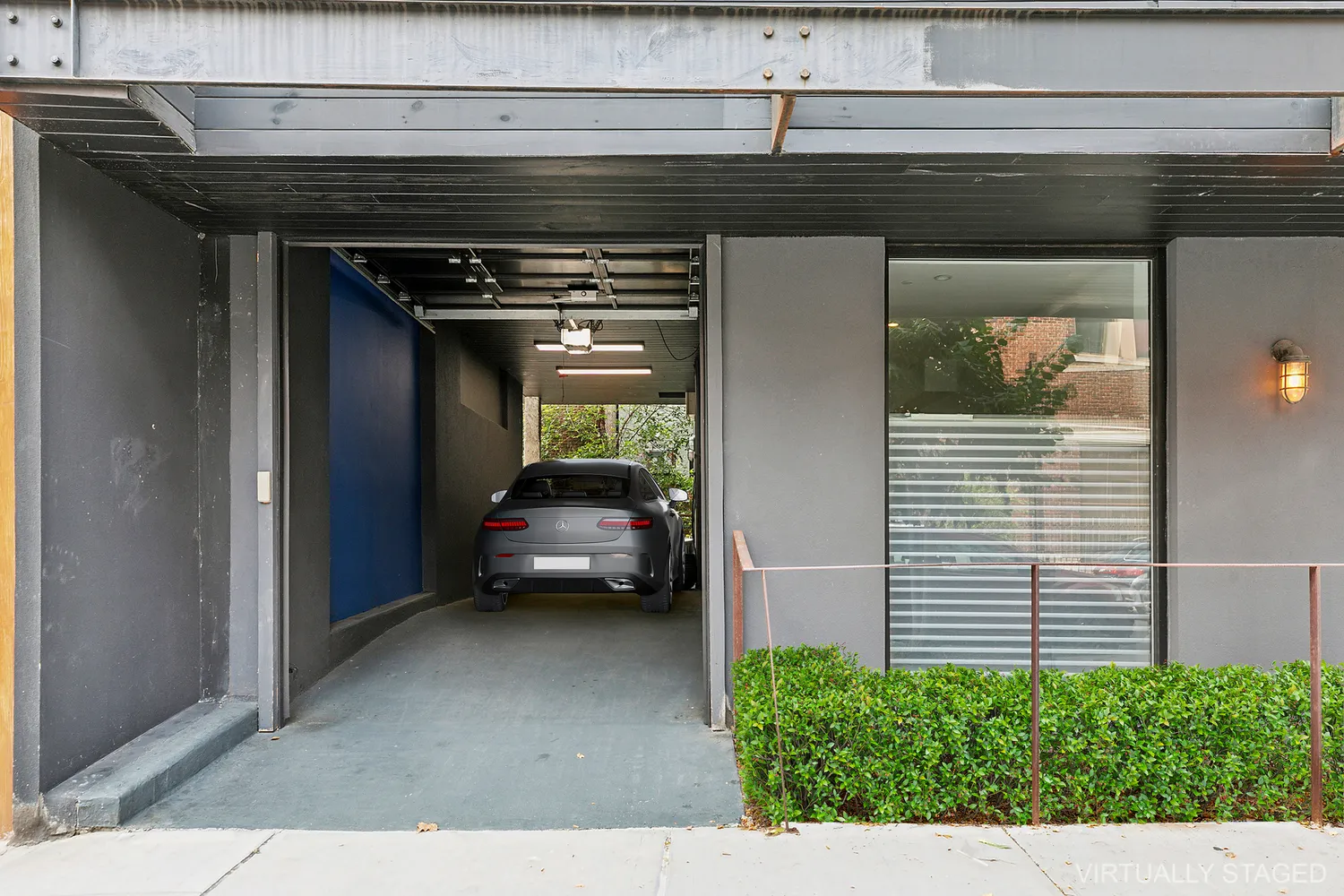 a red car parked in front of a building