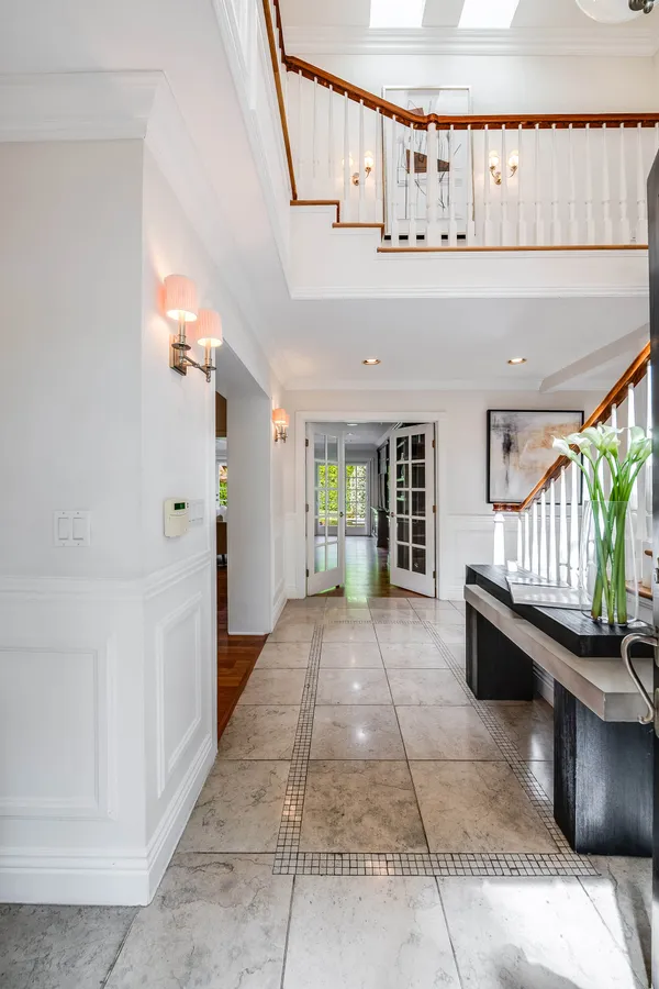 a view of entryway with a front door