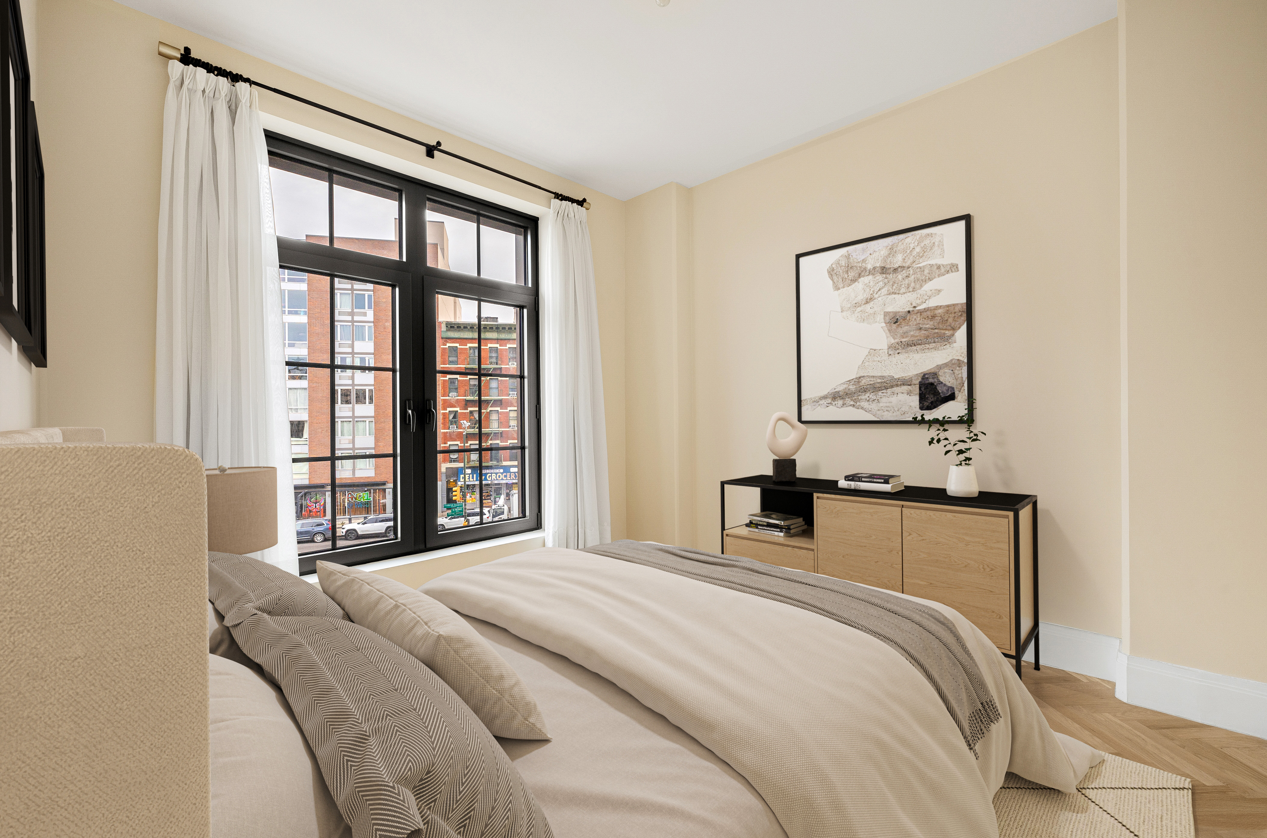 300 West 122nd Street, Unit 4F Manhattan, NY 10027 - Photo 8 of 32 a bedroom with a bed and a window