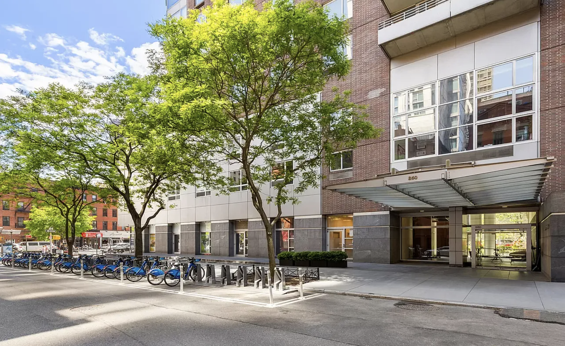 360 East 88th Street, Unit 22C Manhattan, NY 10128 - Photo 30 of 33 a view of a building with a street