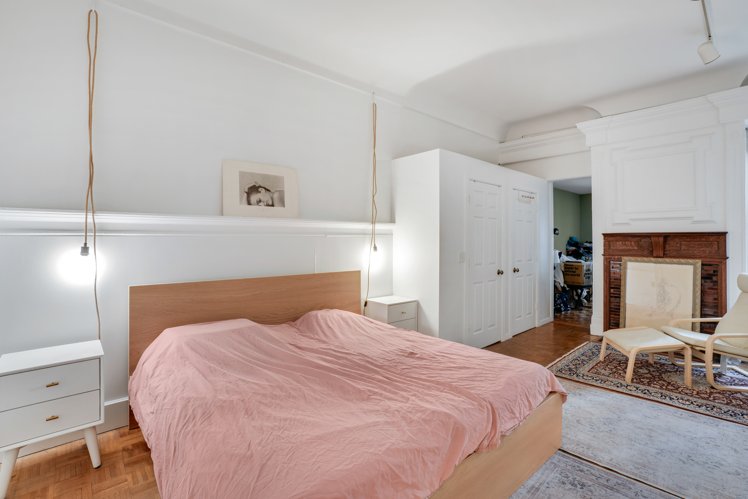 337 West 71st Street, Unit 3 Manhattan, NY 10023 - Photo 6 of 9 a bedroom with a large bed and a dresser