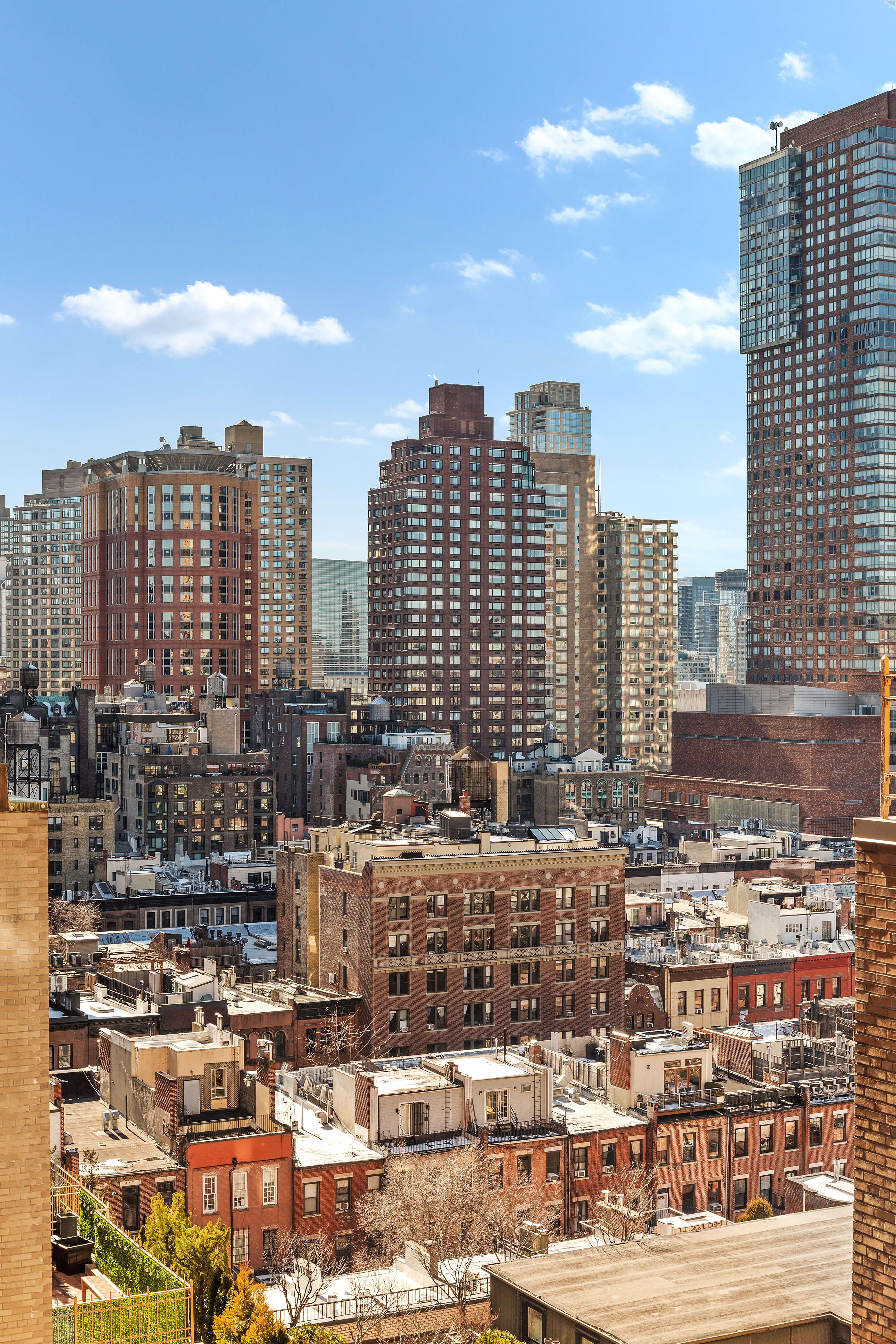 115 Central Park West, Unit 16H Manhattan, NY 10023 - Photo 16 of 30 a view of a city with tall buildings