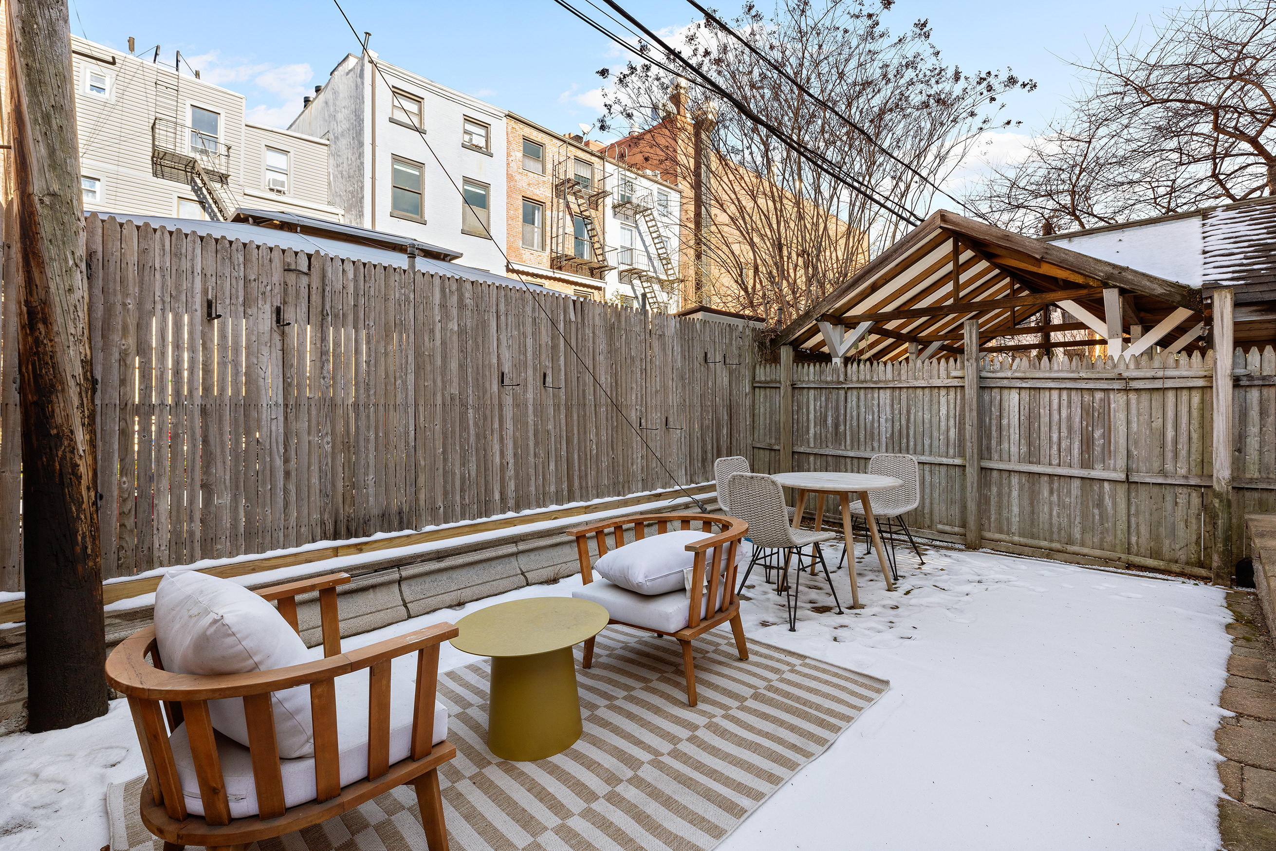 301 Warren Street, Unit 2 Brooklyn, NY 11201 - Photo 9 of 11 a patio with table and chairs