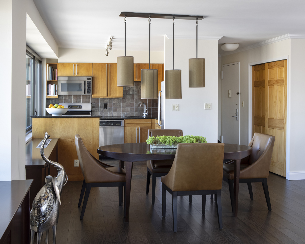 300 East 59th Street, Unit 3105 Manhattan, NY 10022 - Photo 5 of 21 a view of a dining room with furniture and wooden floor