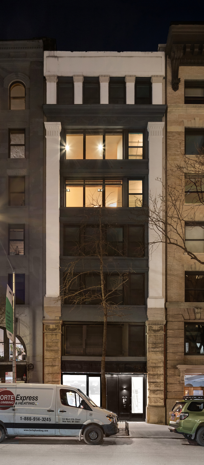 131 West 24th Street, Unit 5/6 Manhattan, NY 10011 - Photo 13 of 14 a front view of a building with a street