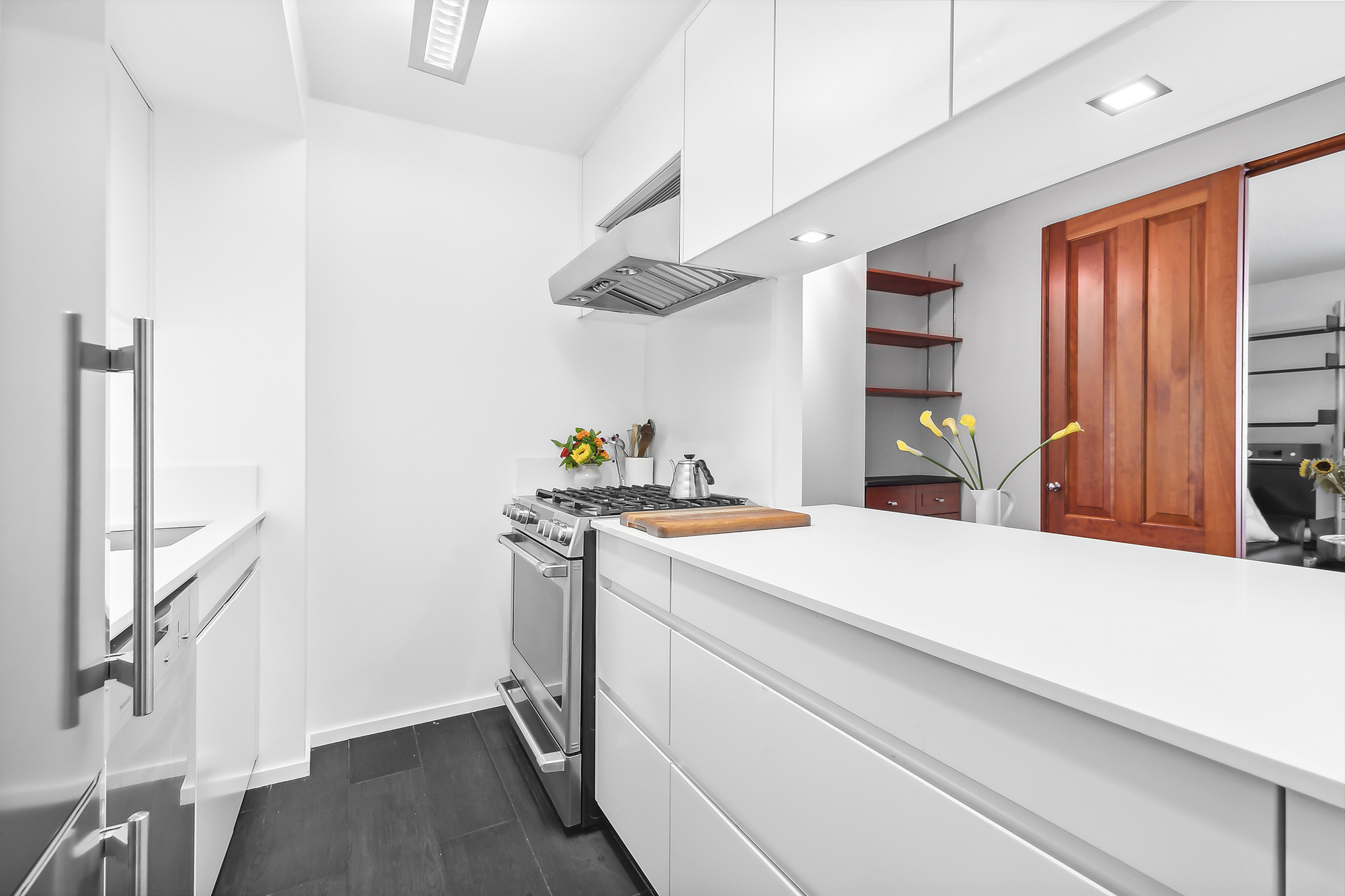 303 Greenwich Street, Unit 7F Manhattan, NY 10013 - Photo 3 of 7 a room with storage and utility