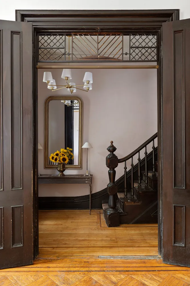 a kitchen with stainless steel appliances granite countertop a stove and refrigerator